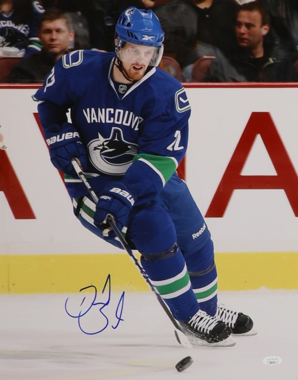 Daniel Sedin Autographed 16x20 Vancouver Canucks Photo with JSA COA - Perfect for Hockey Fans, Sports Memorabilia Collectors & Man Cave Decor
