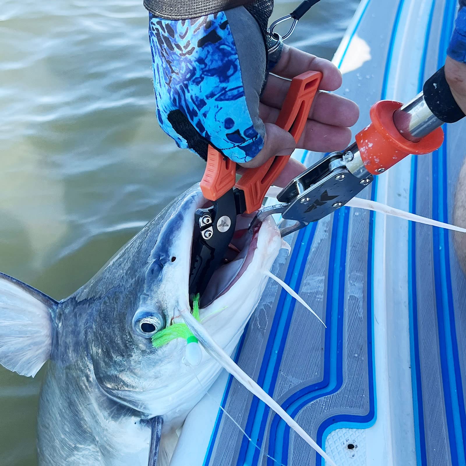 **KastKing Saltwater Resistant Fishing Pliers & Lip Gripper Combo – Durable Fishing Gear with Rubber Handle, Lanyard, Line Cutter, Hook Remover & Sheath – Perfect for Ice Fishing, Freshwater & Saltwater Anglers – Great Gift for Men**    *(Use Cases: Ideal for catching bass, trout, or saltwater species; essential for removing hooks, cutting lines, and handling fish safely during ice fishing or boat trips.)*