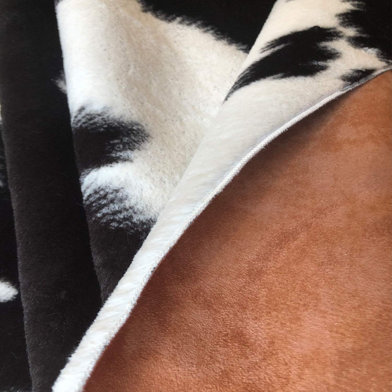 JACCAWS Black and White Faux Cowhide Rug 4.6x6.6 Feet - Soft Faux Fur Area Rug for Living Room, Bedroom, Home Decor - Large Cow Print Rug for Farmhouse, Modern & Bohemian Style