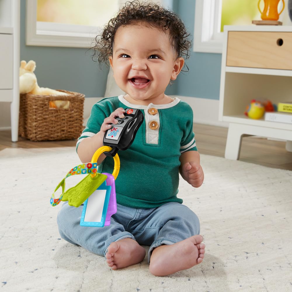 Fisher-Price Laugh & Learn Baby Musical Toy - Play & Go Activity Keys with Teether & Mirror for Infants 6+ Months | Multilingual Developmental Toy for Car Seat, Stroller & Playtime Fun