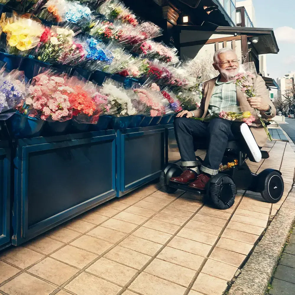 Whill Model C2 Power Wheelchair - Lightweight, Foldable Electric Mobility Scooter for Adults & Seniors - Indoor & Outdoor Use for Shopping, Travel & Daily Activities