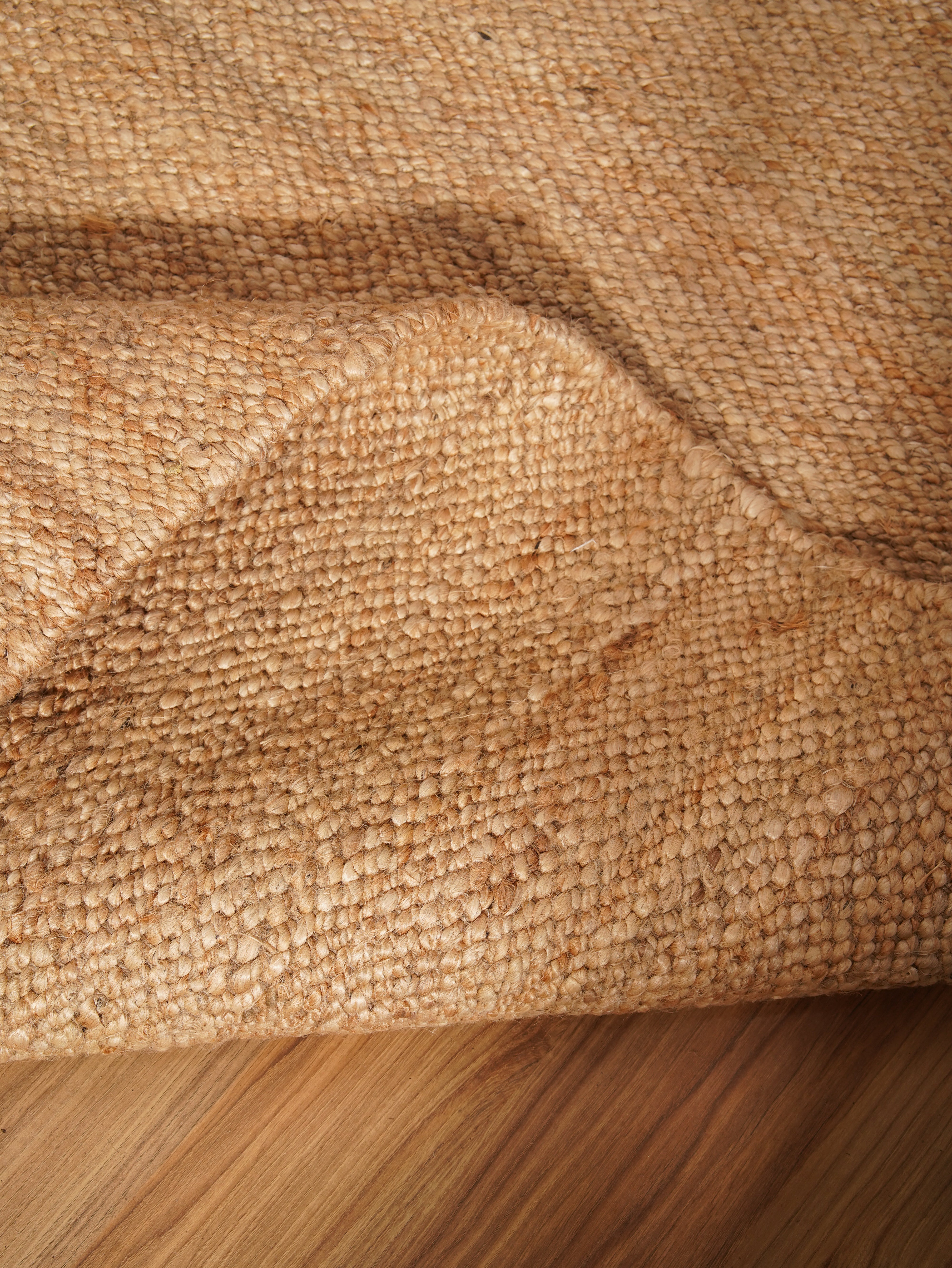 Classic Handwoven Jute Braided Rug - Natural Fiber Floor Mat for Living Room, Bedroom, or Entryway - Eco-Friendly Home Decor