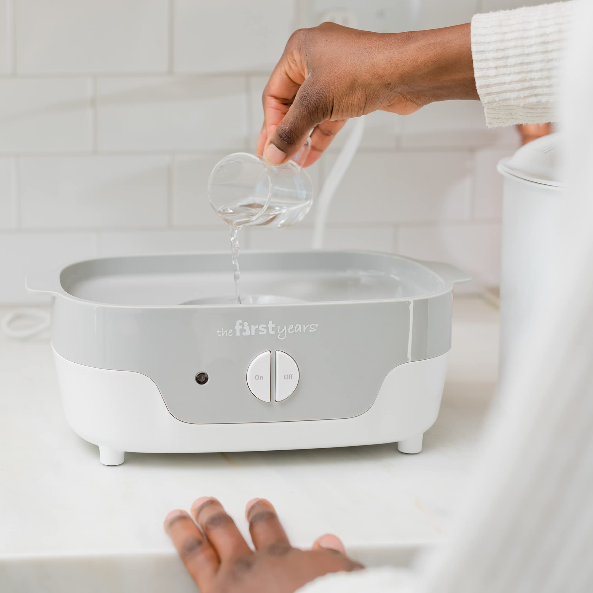 The First Years Modular Baby Bottle Sterilizer - Countertop Steam Sterilizer for Baby Bottles, Pacifiers & Breast Pump Parts - BPA-Free Baby Feeding Essentials - Perfect for Home, Travel & Daycare Use