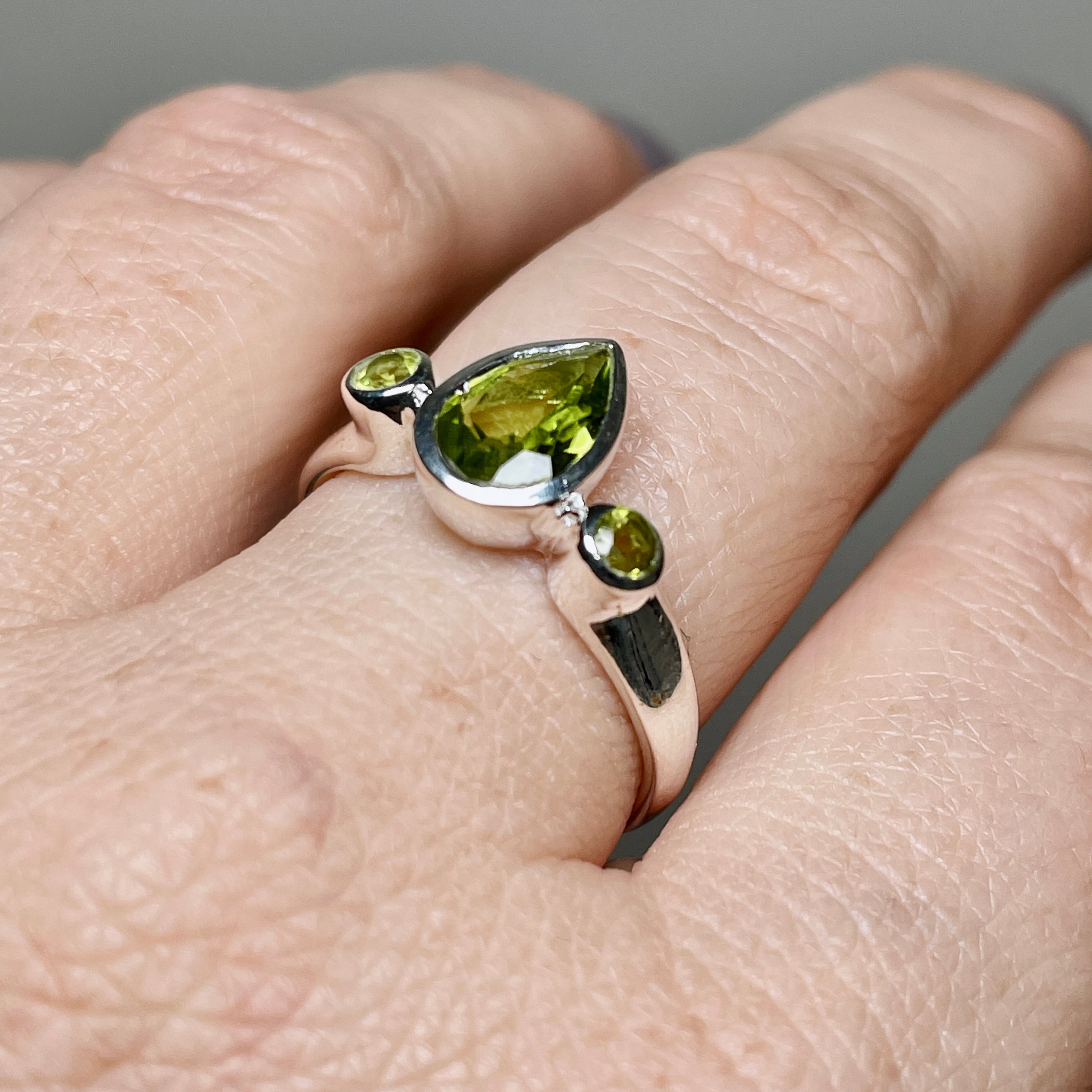 Peridot Faceted Gemstone Teardrop Ring with Accent Stones R3668 - Elegant Green Jewelry for Women, Perfect for Weddings, Parties & Special Occasions