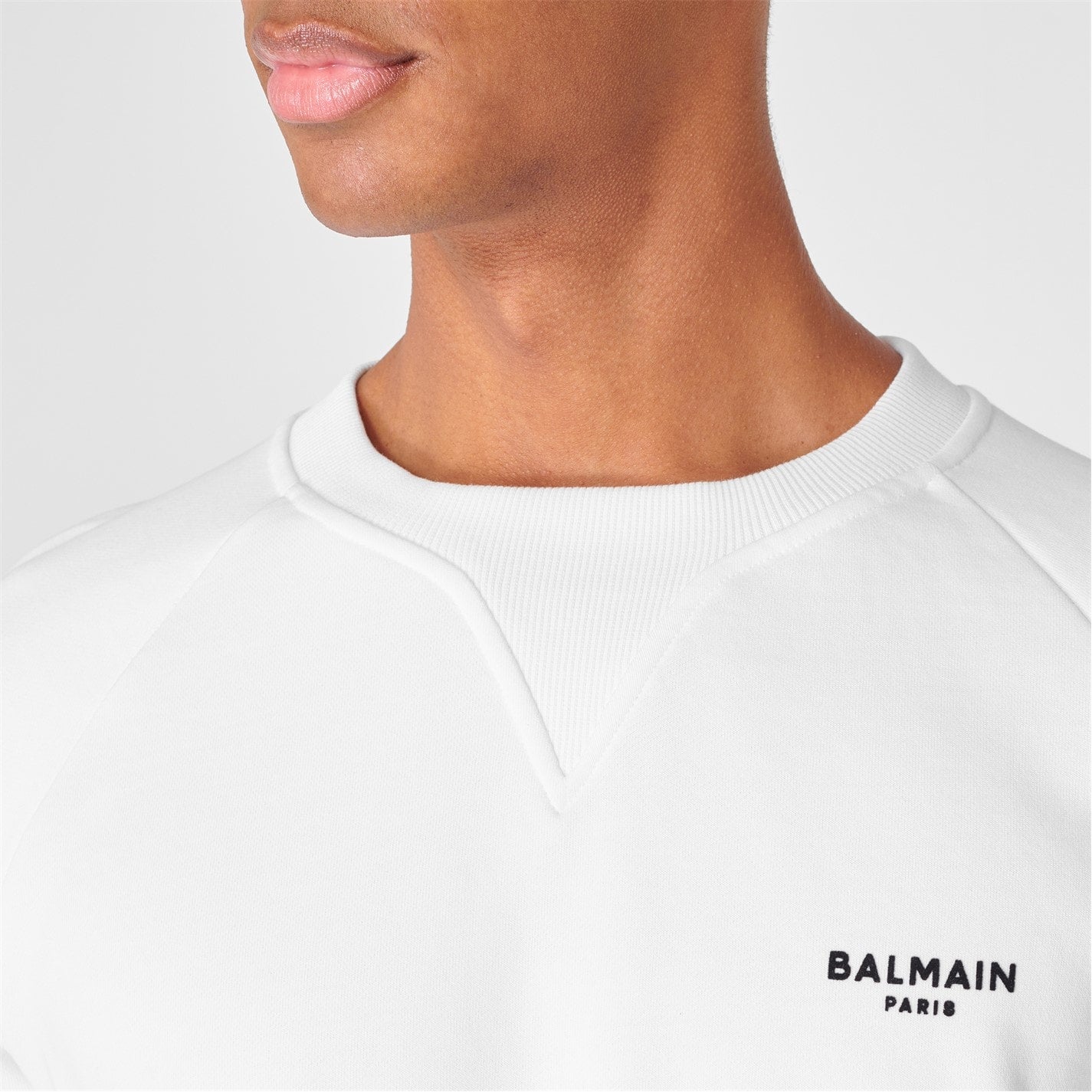Balmain White Small Logo Sweatshirt for Women | Luxury Cotton Pullover | Casual Streetwear & Lounge Wear | Perfect for Everyday Outfits and Relaxing at Home