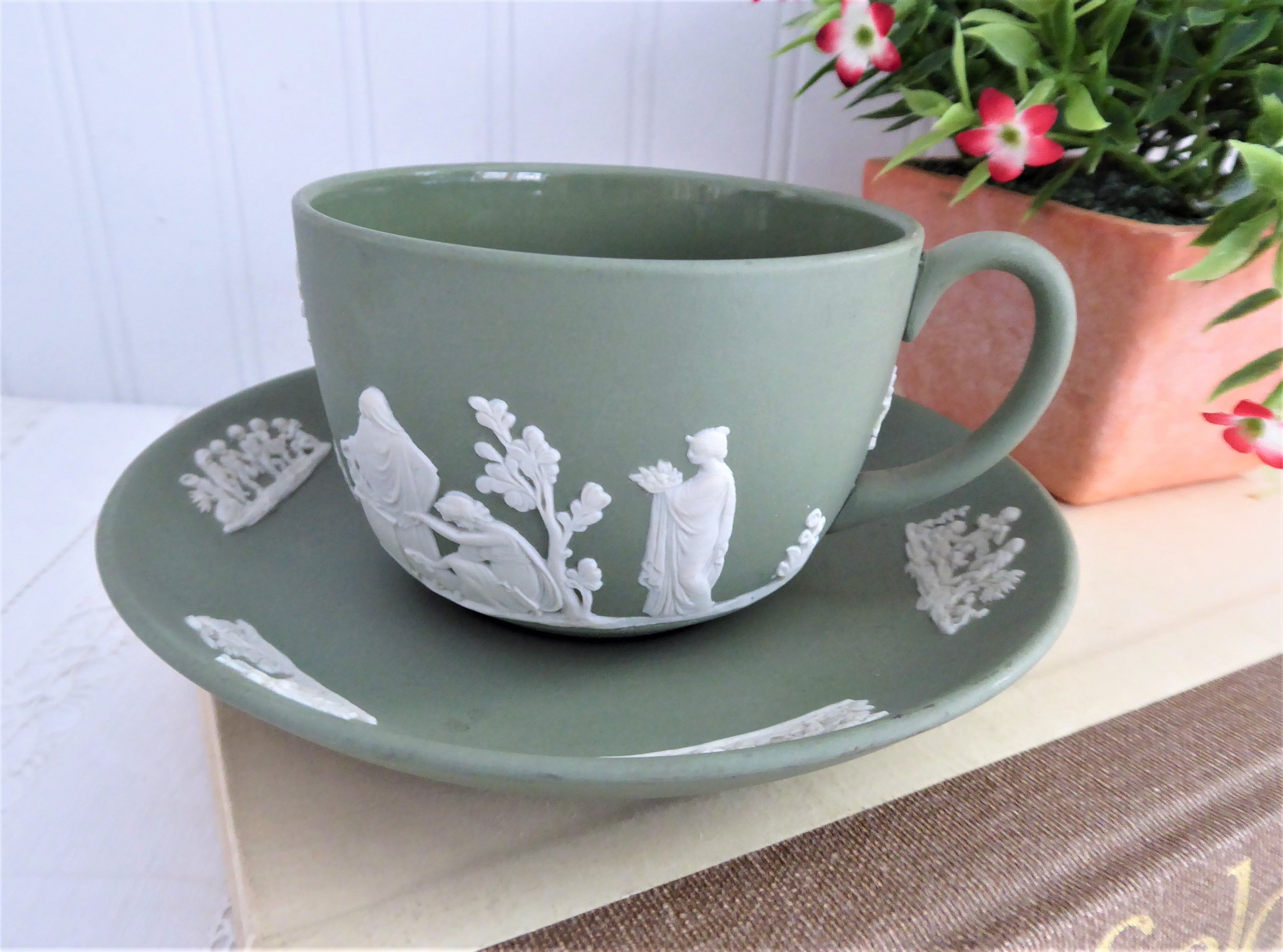 Vintage Wedgwood Green Jasperware Cup and Saucer Set with Cherub Sacrifice Figures - Made in England 1970s - Perfect for Tea Time, Collectible Display, and Wedgwood Enthusiasts