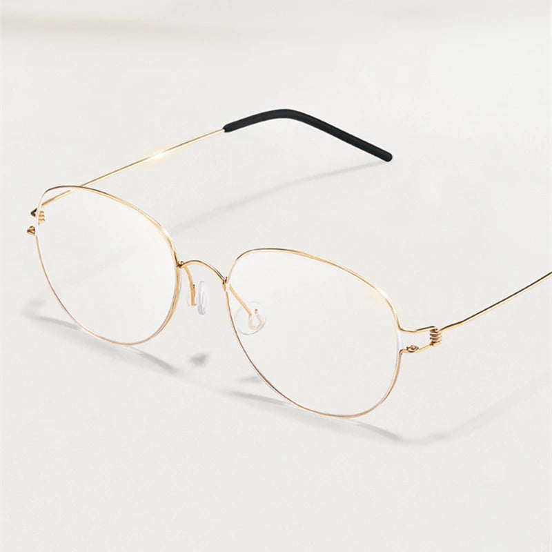 Stylish Black Titanium Oval Full Rim Screwless Eyeglasses for Women - Perfect for Work, Reading & Everyday Fashion