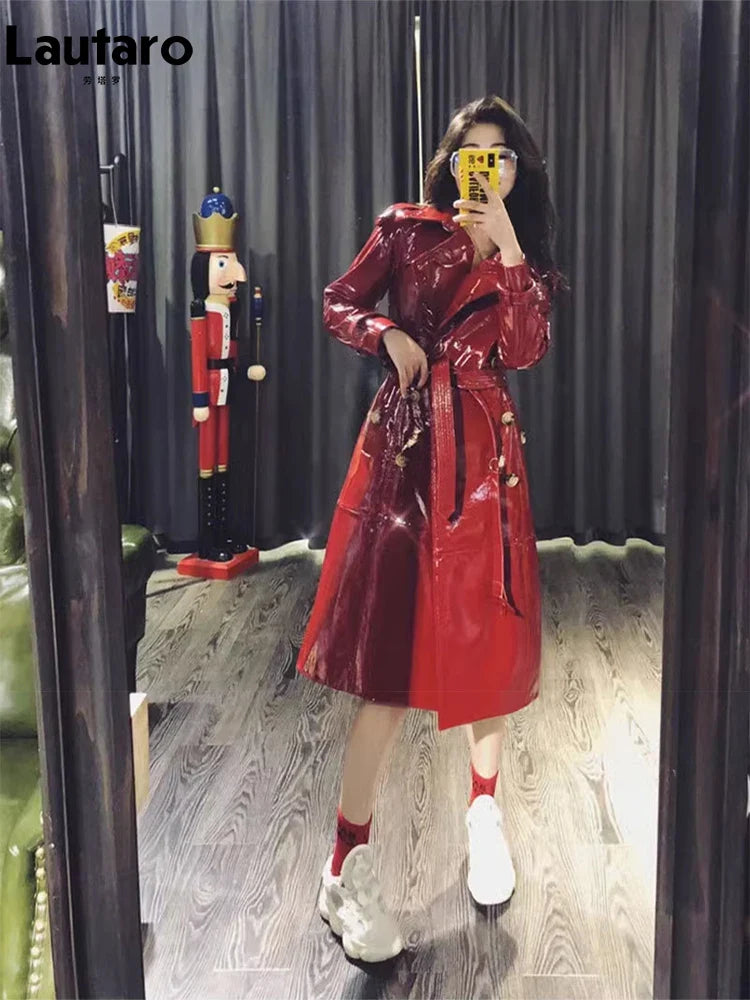 Women's Autumn Long Shiny Reflective Patent Faux Leather Trench Coat - Double Breasted Runway Style with Sashes | European Fashion Outerwear for Fall Season | Perfect for Evening Events, Parties and Fashion Shows