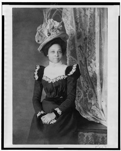 Vintage Photo of Young African American Woman with Hands Folded - Historical Black & White Portrait for Home Decor, Office Wall Art, and Ancestry Research