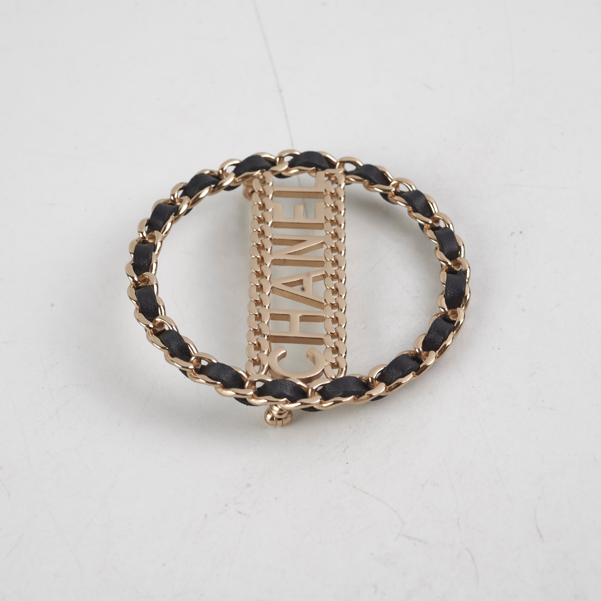 Chanel CC Round Black and Gold Brooch - Elegant Fashion Accessory for Women, Perfect for Dresses, Jackets, and Bags
