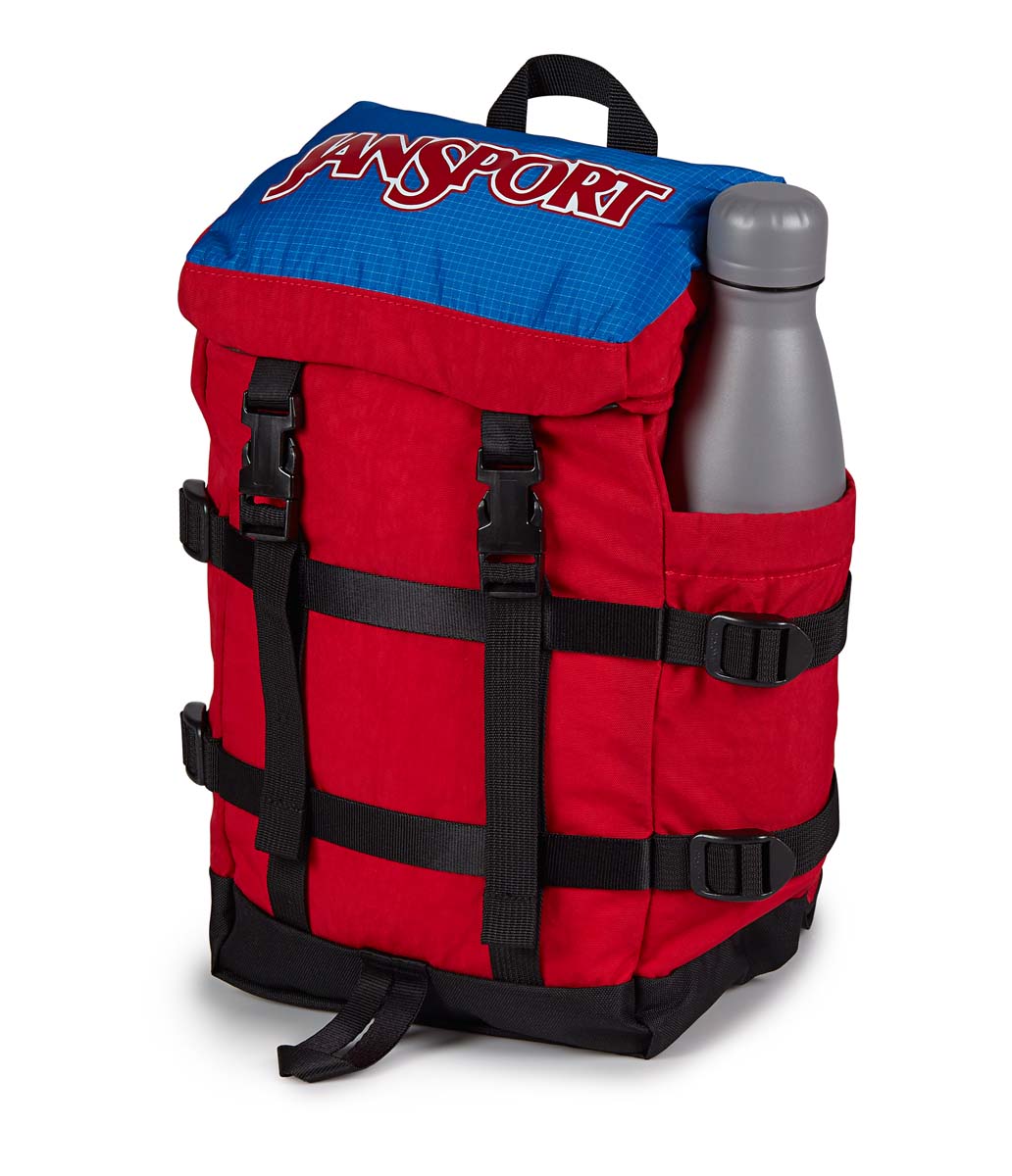 JanSport Mini Skip Backpack - Lightweight & Durable School Bag for Students, Travel & Everyday Use | Red Tape Design