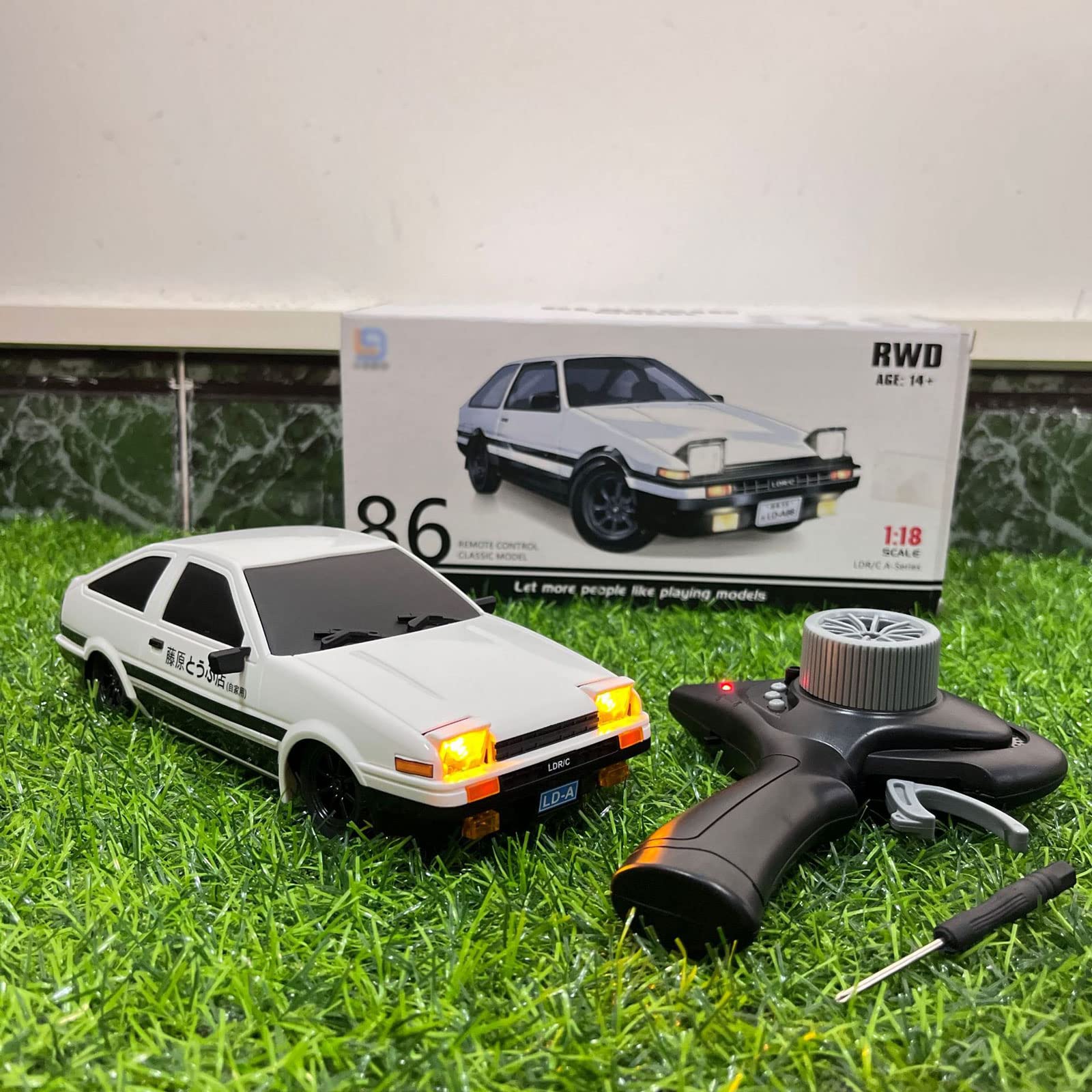 2.4GHz Remote Control RC Truck 1/18 Scale AE86 Fast Rally Car with Reversible Headlights, Anti-Skid & Anti-Fall Design - Ready-to-Run RTR Model for Kids & Adults | Perfect for Off-Road Racing, Backyard Driving, and Christmas Gifts