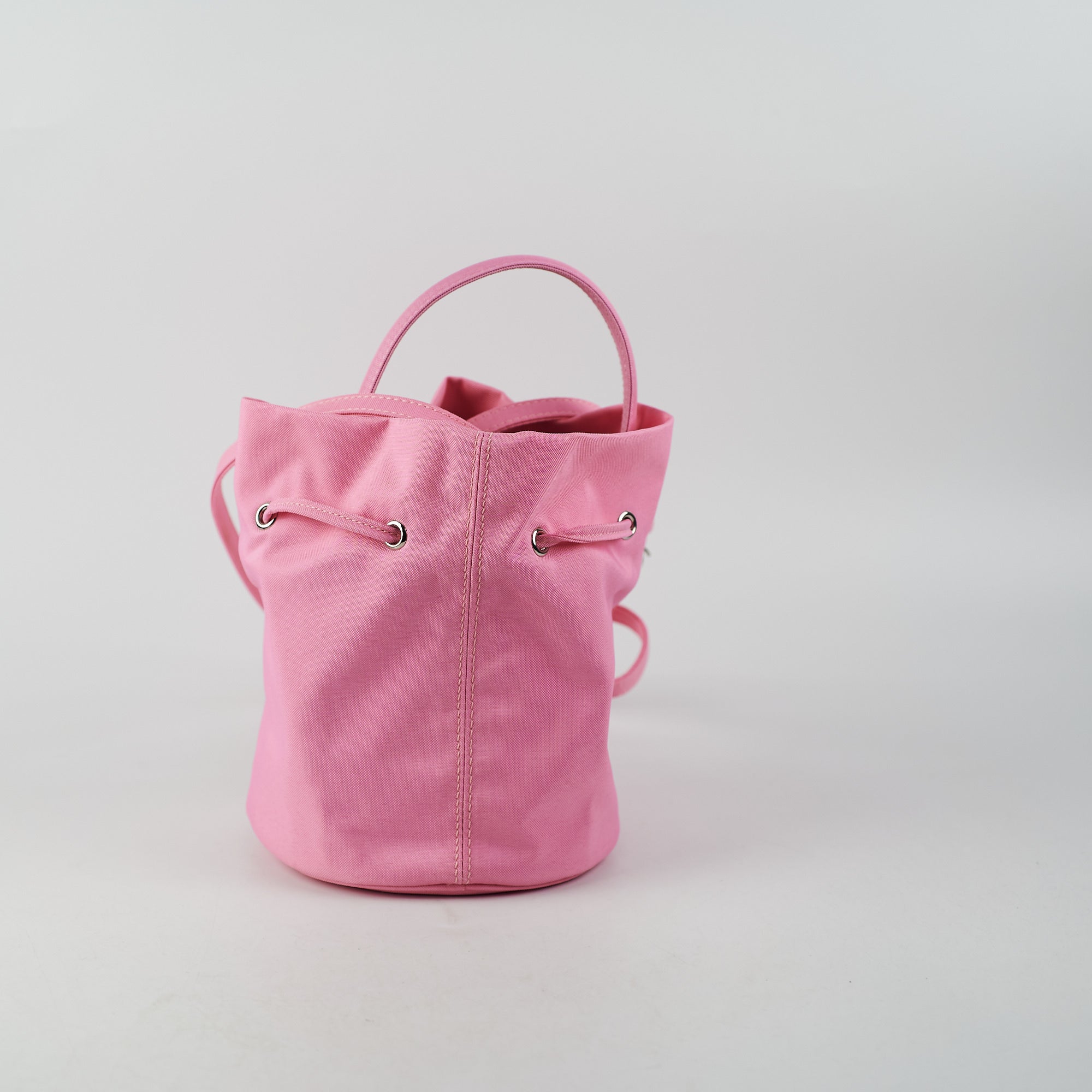 Balenciaga Nylon Wheel XS Bucket Bag in Pink | Luxury Designer Handbag for Women | Perfect for Everyday Use, Travel & Fashion Outings