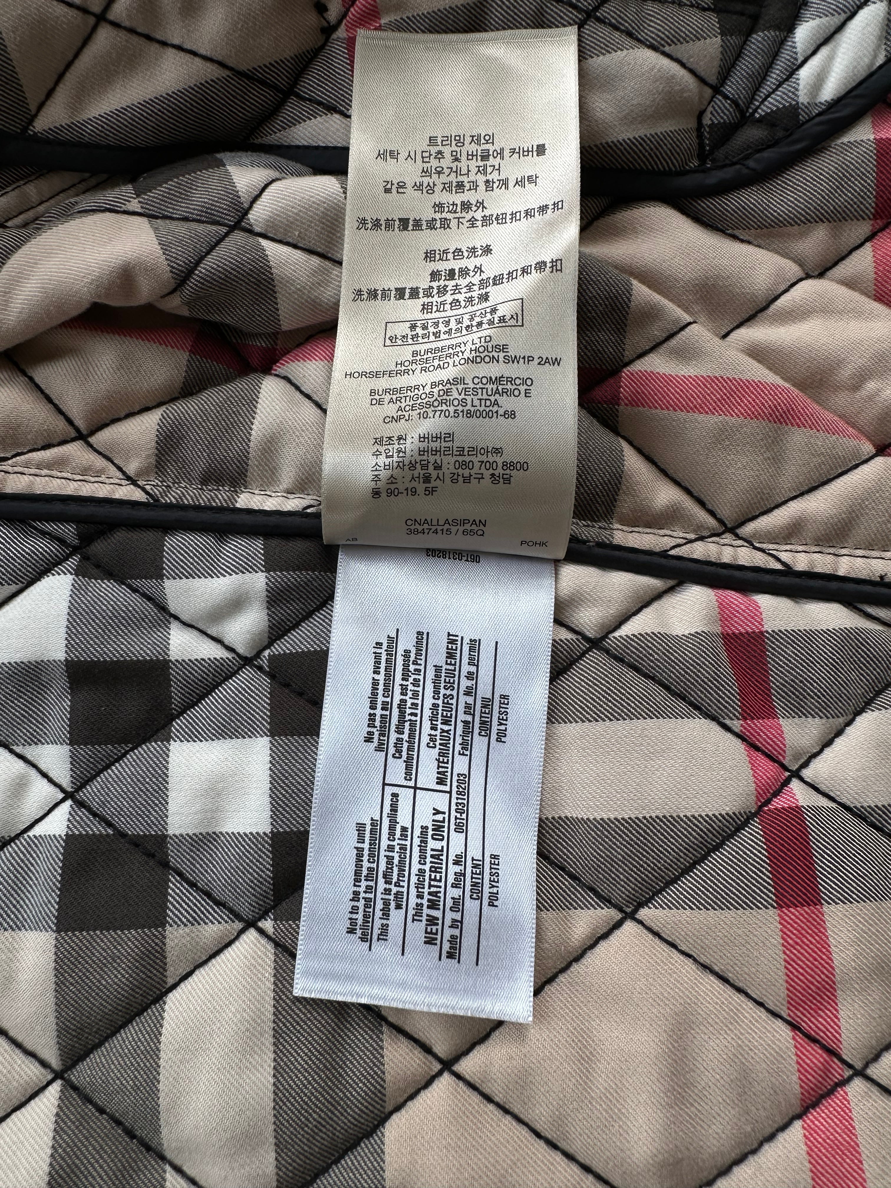 Burberry Brit Black Quilted Zip Up Jacket for Women - Stylish Winter Coat with Hood, Perfect for Outdoor Activities & Casual Wear