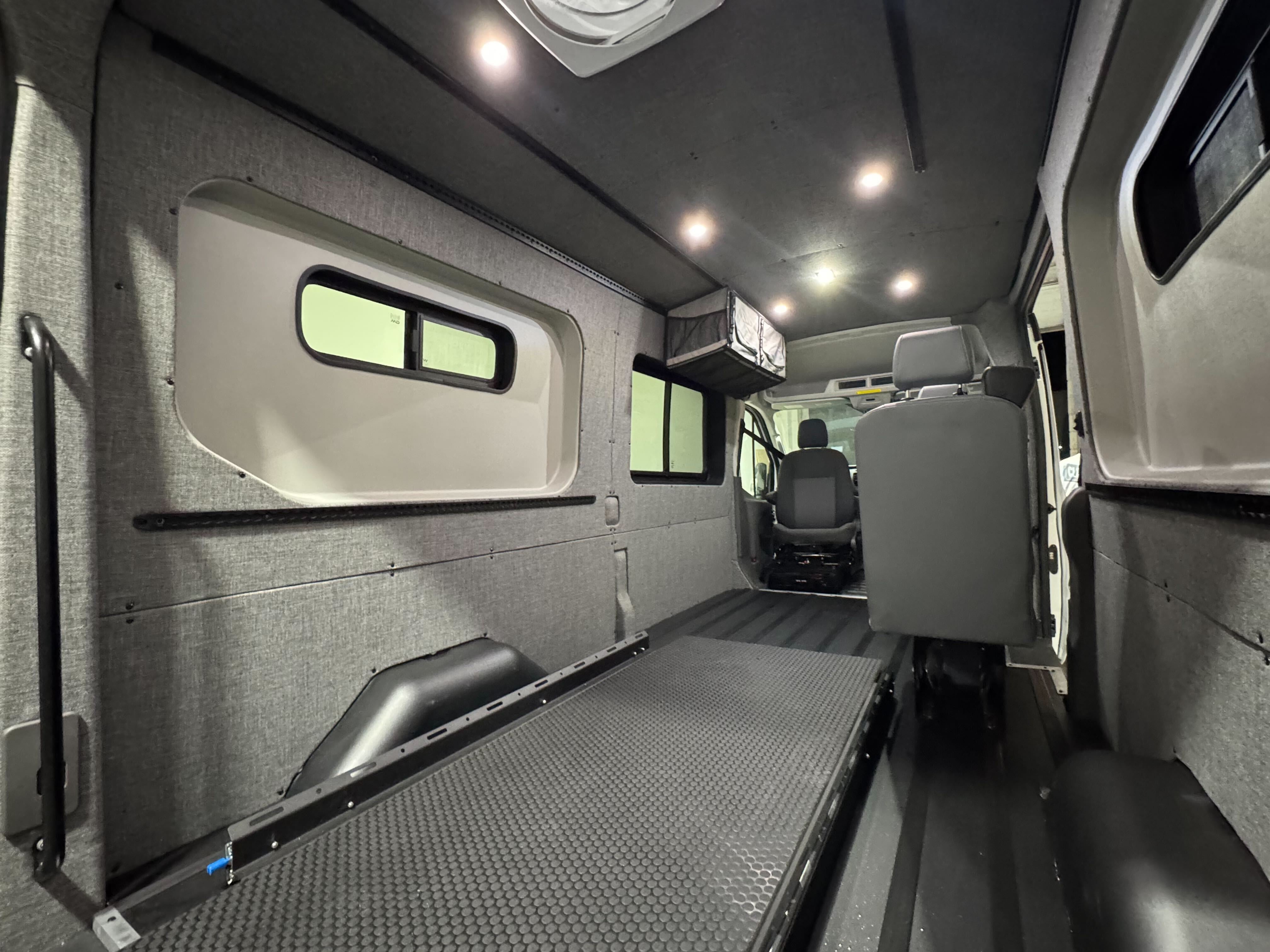 Ford Transit Innie Sleeper - Driver Side Sleeper Conversion Kit for Camper Vans | Comfortable Sleeping Solution for Road Trips & Camping Adventures