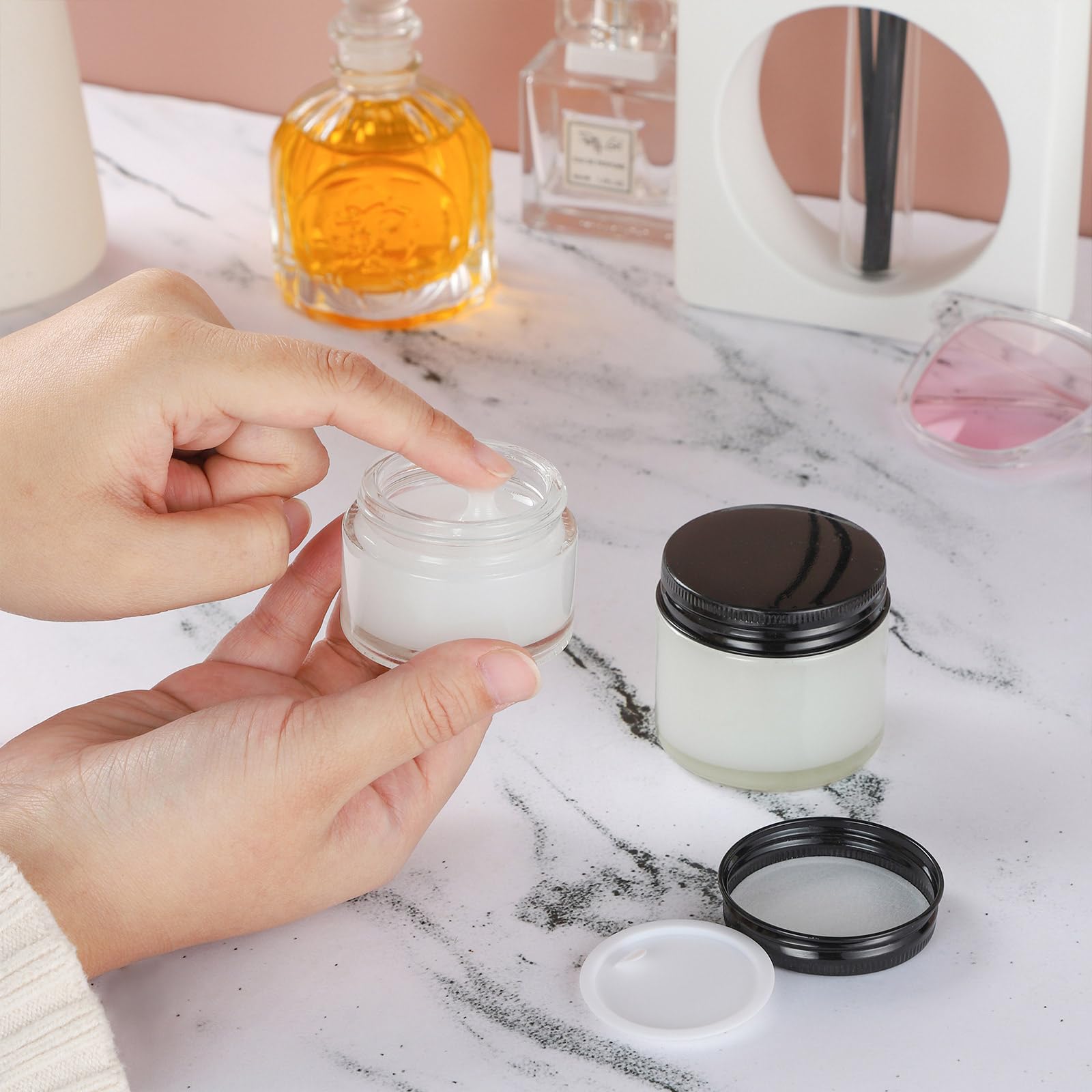 24 Pack 2oz Clear Glass Jars with Black Metal Lids - Small Empty Cosmetic Containers with Inner Liners - Travel-Sized Lotion Jars with Labels - Perfect for DIY Beauty Products, Travel Toiletries & Home Organization