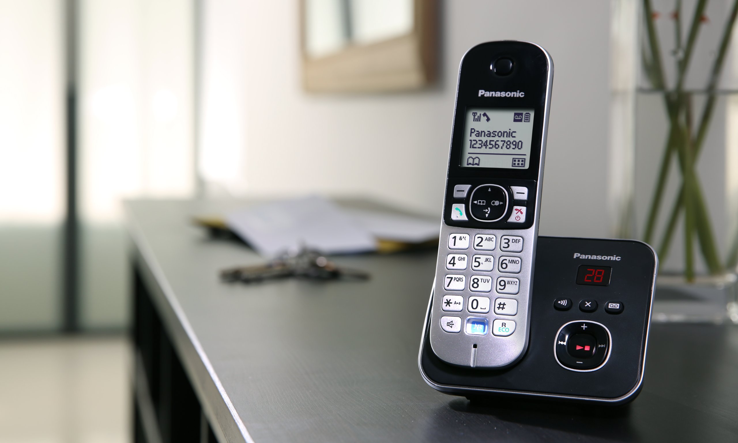 Panasonic KX-TG6824EB Quad Cordless DECT 6.0 Phone System with Answering Machine - Black/Silver - Ideal for Home & Small Business Office Use