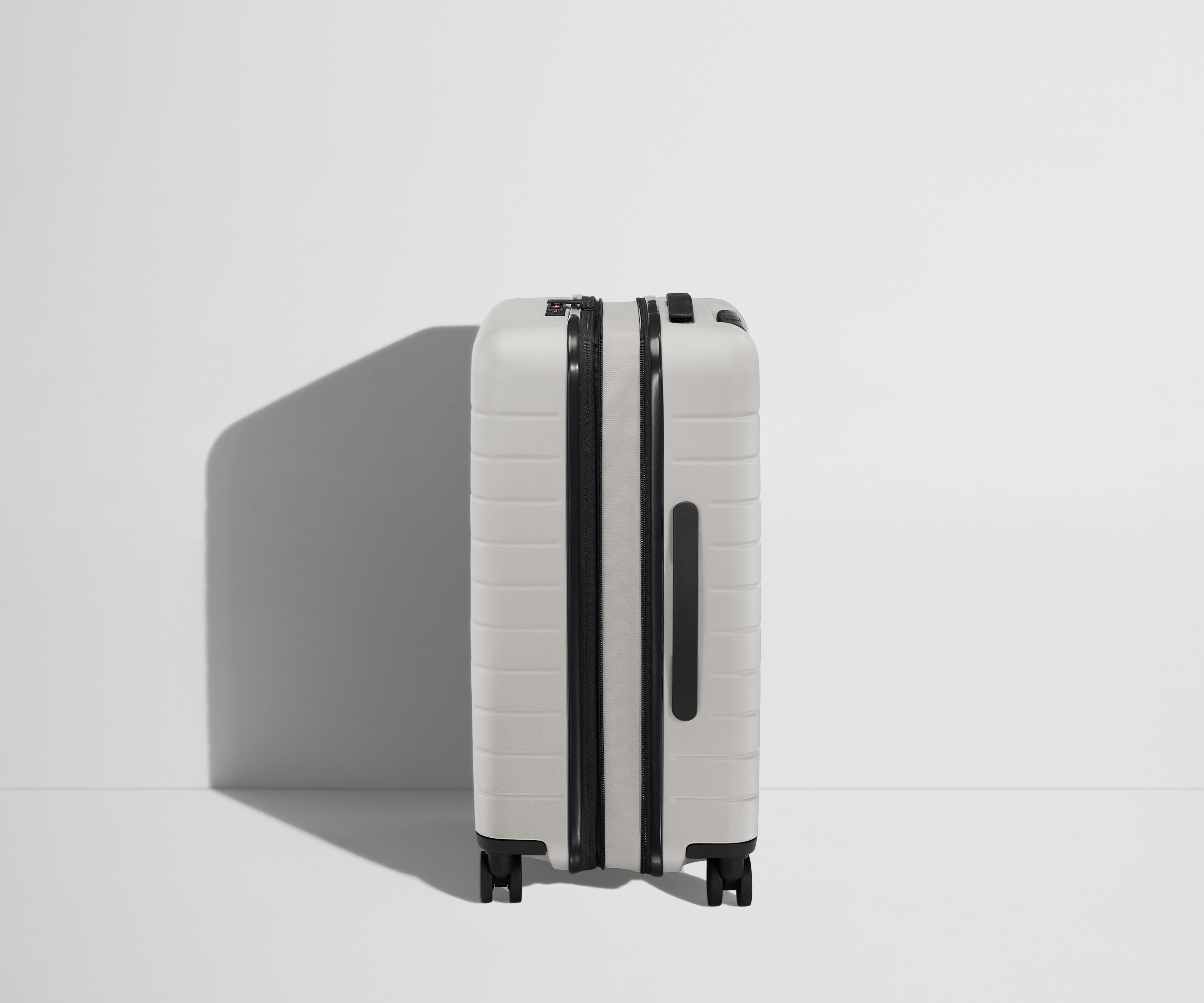 The Bigger Carry On Flex Suitcase in Cloud Gray - Lightweight Expandable Luggage for Travel, Business Trips & Weekend Getaways