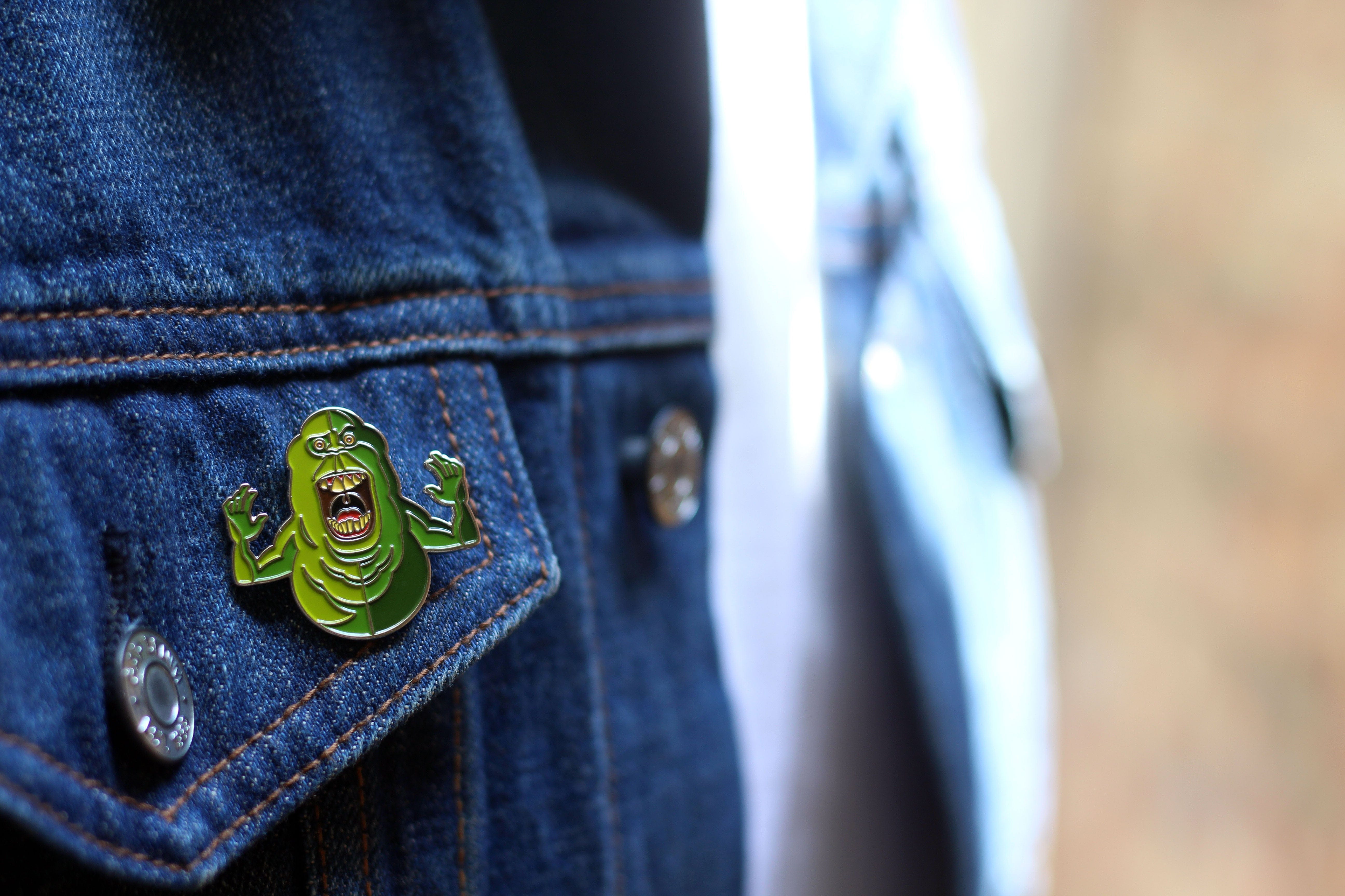 Ghostbusters Slimer Enamel Pin - Officially Licensed Collectible Badge for Fans, Cosplay & Backpacks - Perfect for Halloween, Comic Con & Movie Merchandise Lovers