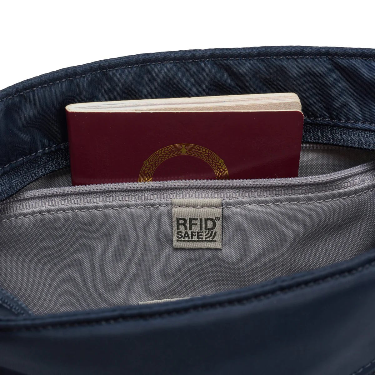 Pacsafe Women's Anti-Theft Crossbody Bag - Secure Travel Purse for Commuting, Shopping & Sightseeing | RFID Protection & Cut-Resistant Straps