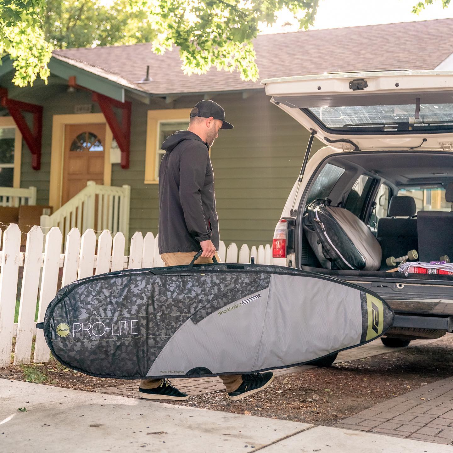 **Rhino Pro Lite Travel Surfboard Bag 6'0 to 7'6 - Waterproof & Padded Protection for 1-2 Boards (Fish/Hybrid/Big Short) - Perfect for Surf Trips & Air Travel**