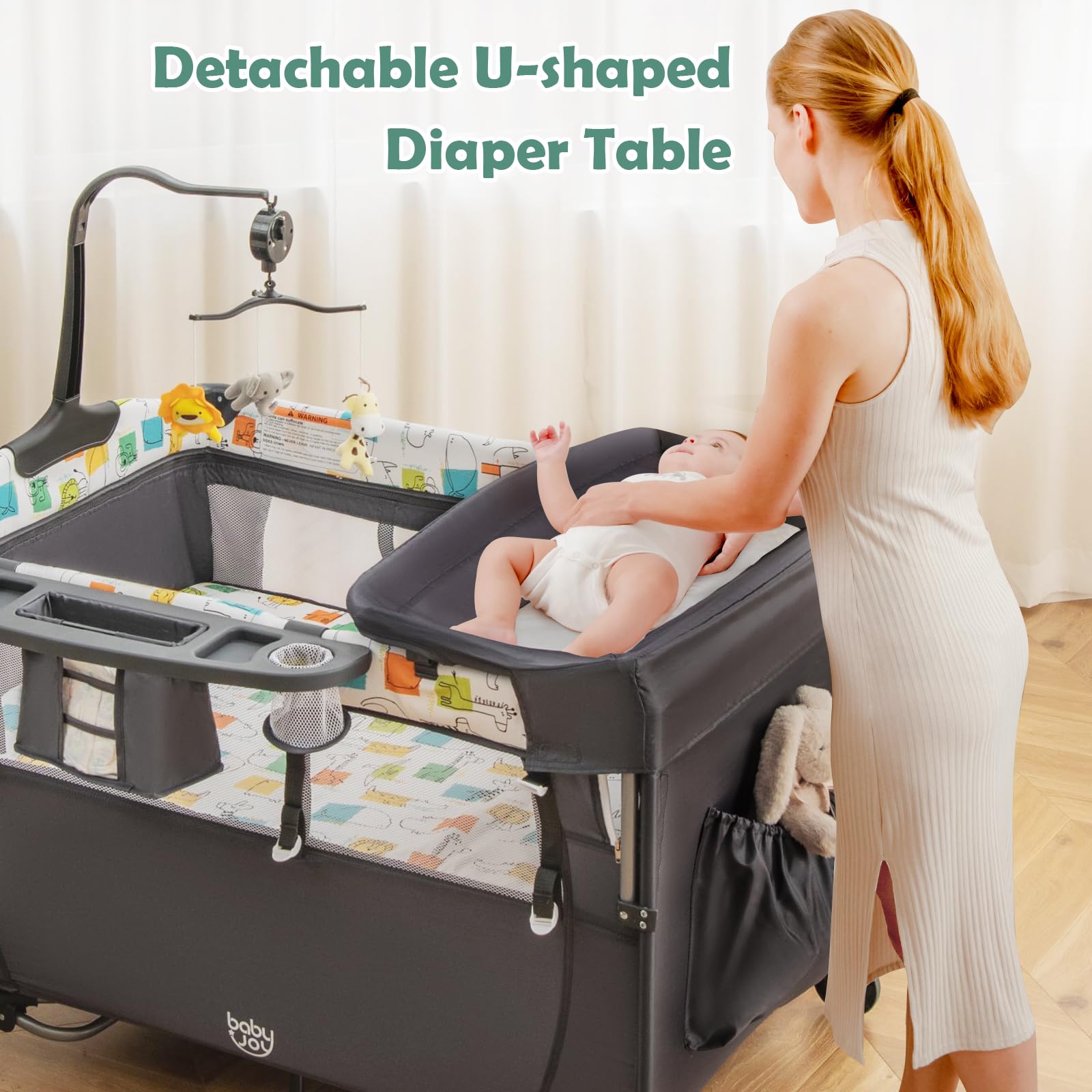 BABY JOY 5-in-1 Pack and Play with Bassinet | Portable Baby Bedside Sleeper & Playard for Newborn to Toddler | U-Shaped Diaper Changer, Safety Strap, Music Box & Hanging Toys | Perfect for Nursery, Travel & On-the-Go Parenting