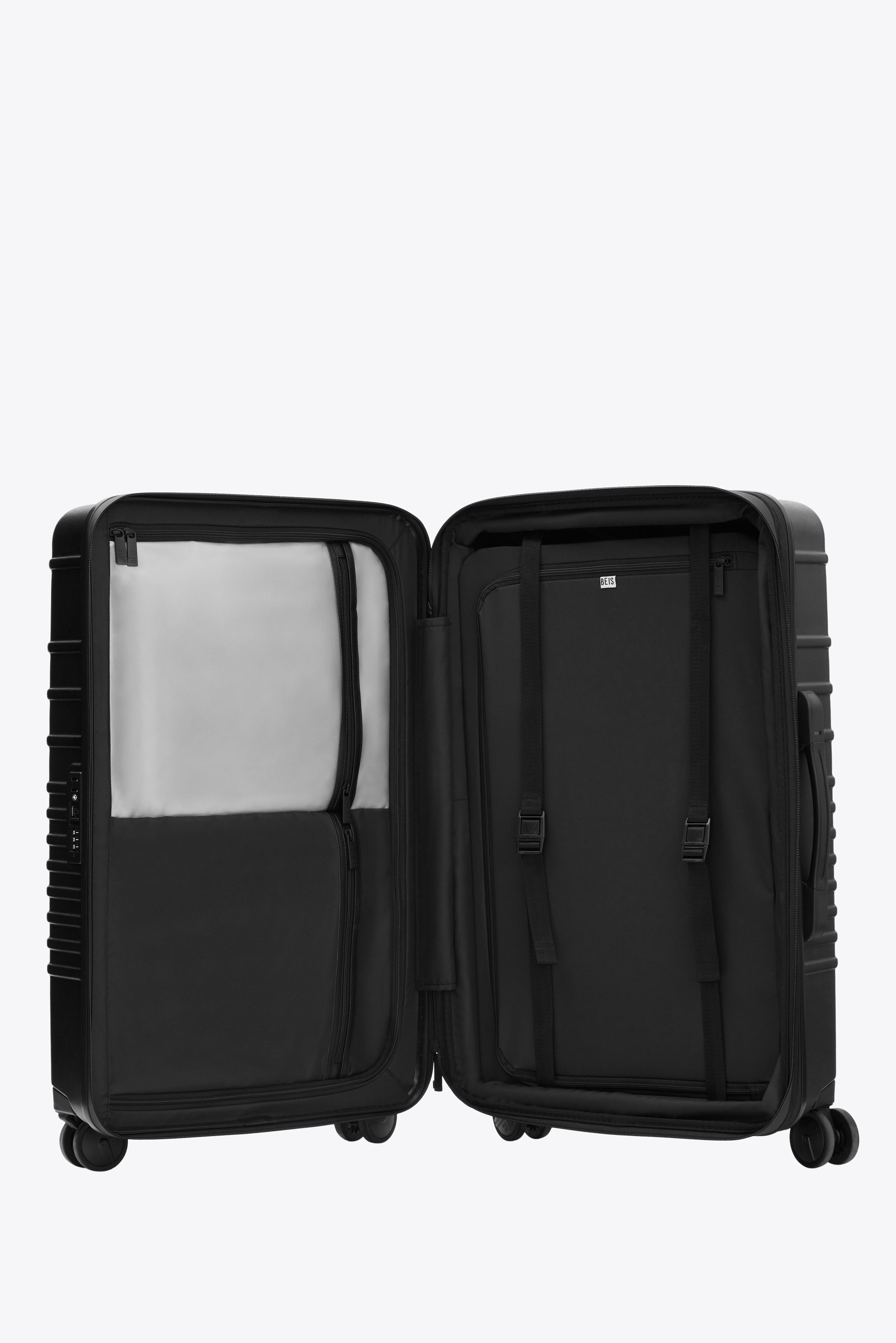 All Black Medium Check-In Roller Luggage - Perfect for Business Travel & Weekend Getaways