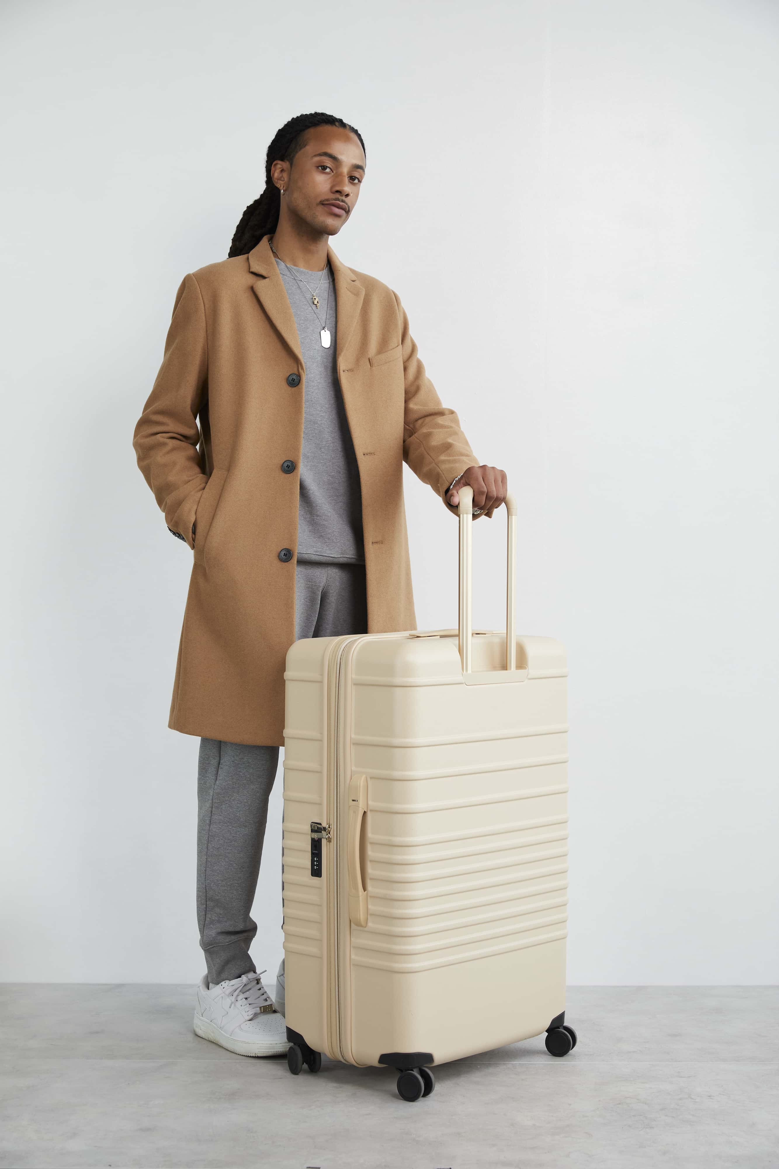 Large Beige Check-In Luggage Roller Suitcase - Perfect for Air Travel, Business Trips & Vacation Packing