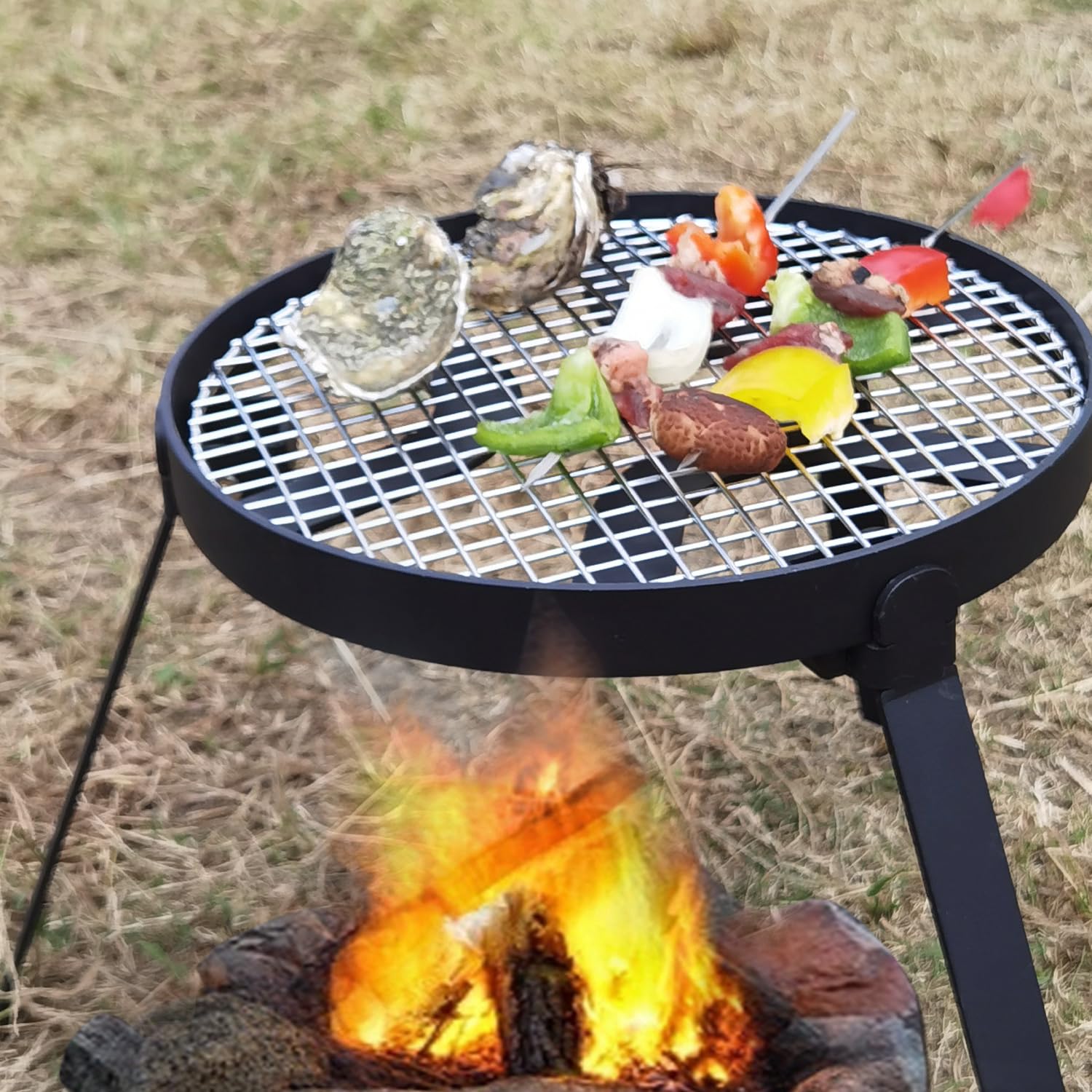YBTMG Heavy Duty Folding Campfire Tripod with 304 Stainless Steel Grill - Cast Iron Camping Stand for Dutch Oven Cooking, BBQ, Picnic, Hiking & Outdoor Adventures - Perfect for Backyard Grilling, Camping Trips and Wilderness Cooking