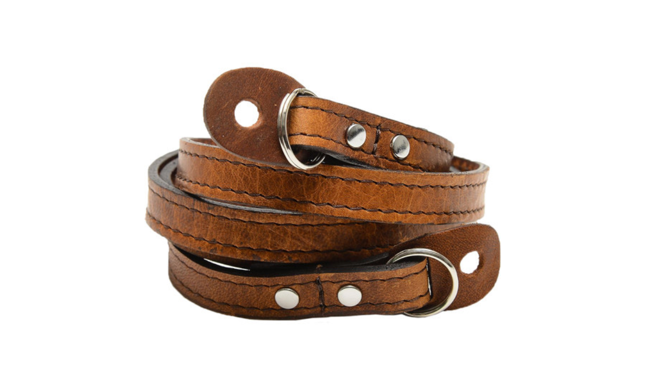 ONA Leather Sevilla Camera Strap in Antique Cognac - Premium Adjustable Neck Strap for DSLR & Mirrorless Cameras - Perfect for Travel, Street & Wedding Photography