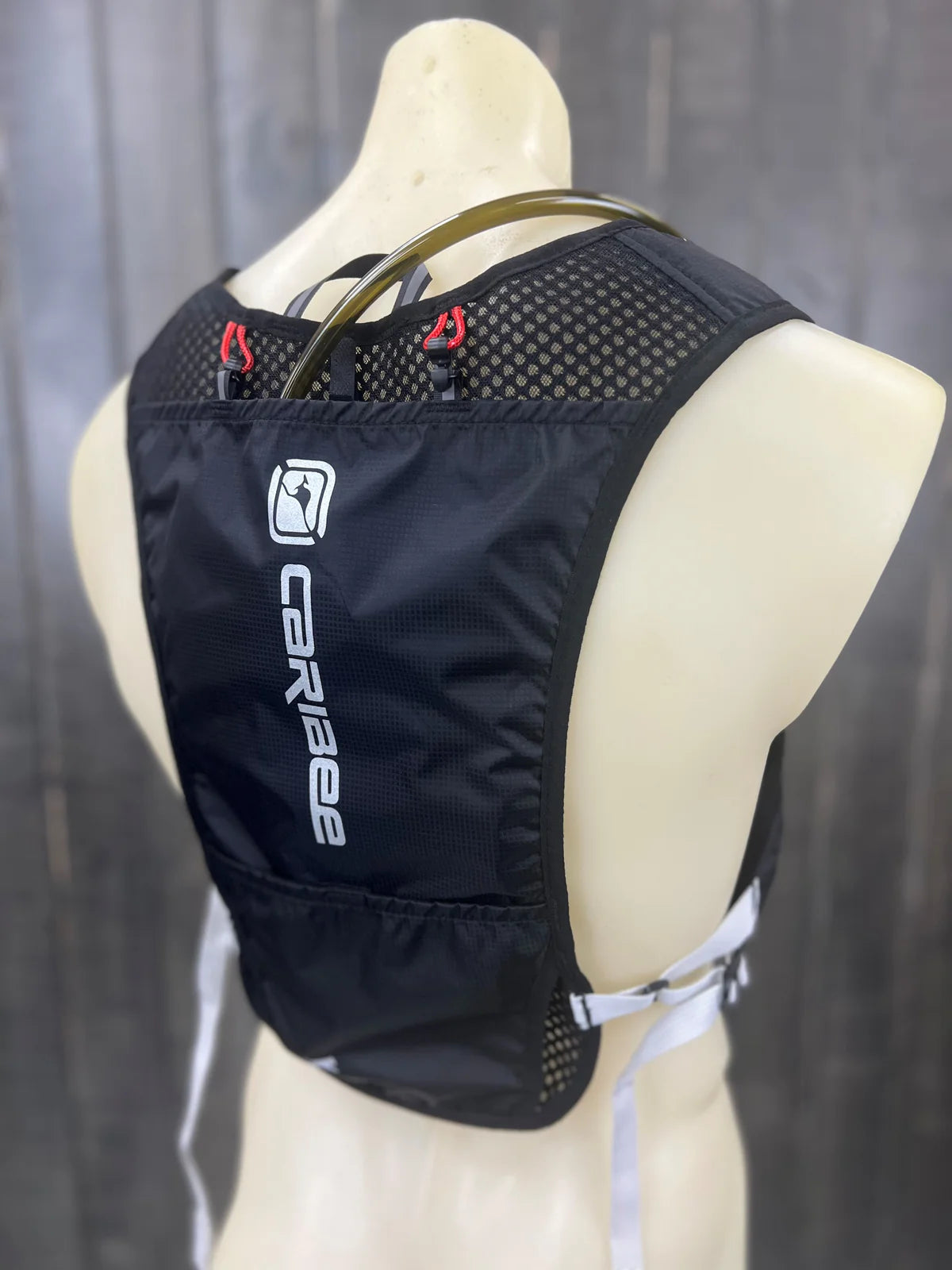 Caribee Coyote Runner 2L Hydration Vest - Lightweight Running Hydration Pack for Trail Runners & Hikers - Perfect for Outdoor Adventures & Marathon Training - Black