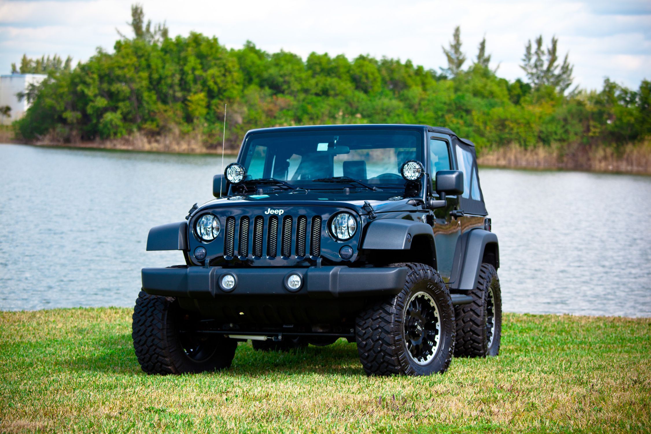 JL Audio SB J JK2DR/10W1v3/BK Stealthbox Subwoofer for 2007-2023 Jeep Wrangler 2-Door with Black Interior - 10W1v3 300W Power - Perfect for Off-Road Adventures & Car Audio Upgrades