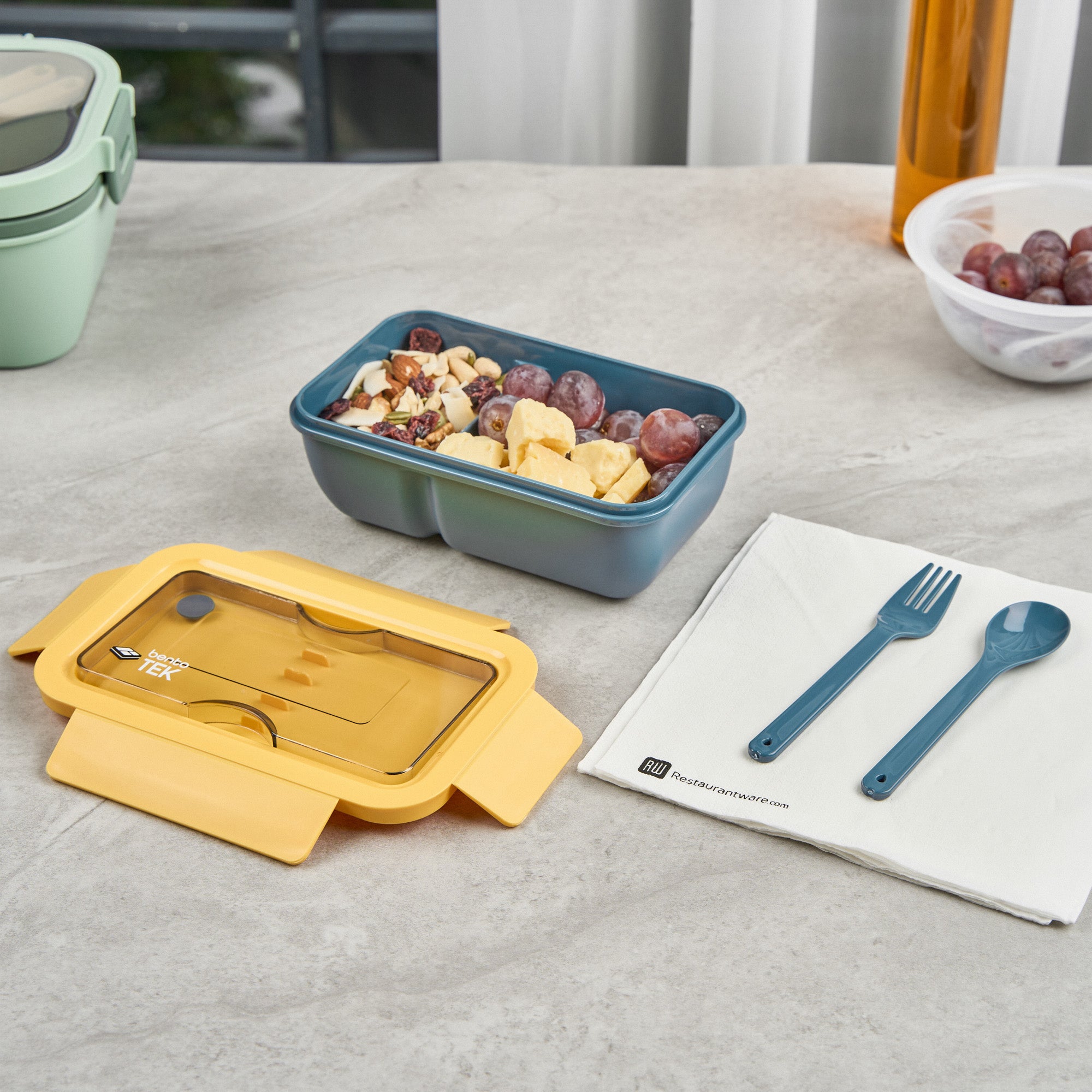 Bento Tek 29 oz Blue and Yellow BPA Free Lunch Box with Fork & Spoon - Microwave Safe, 7.75
