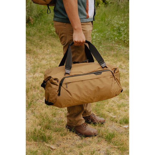 Peak Design Travel Duffel 35L Carry-On Duffel Bag - Waterproof & Durable Coyote Brown Backpack for Adventure Travel, Camping & Outdoor Activities