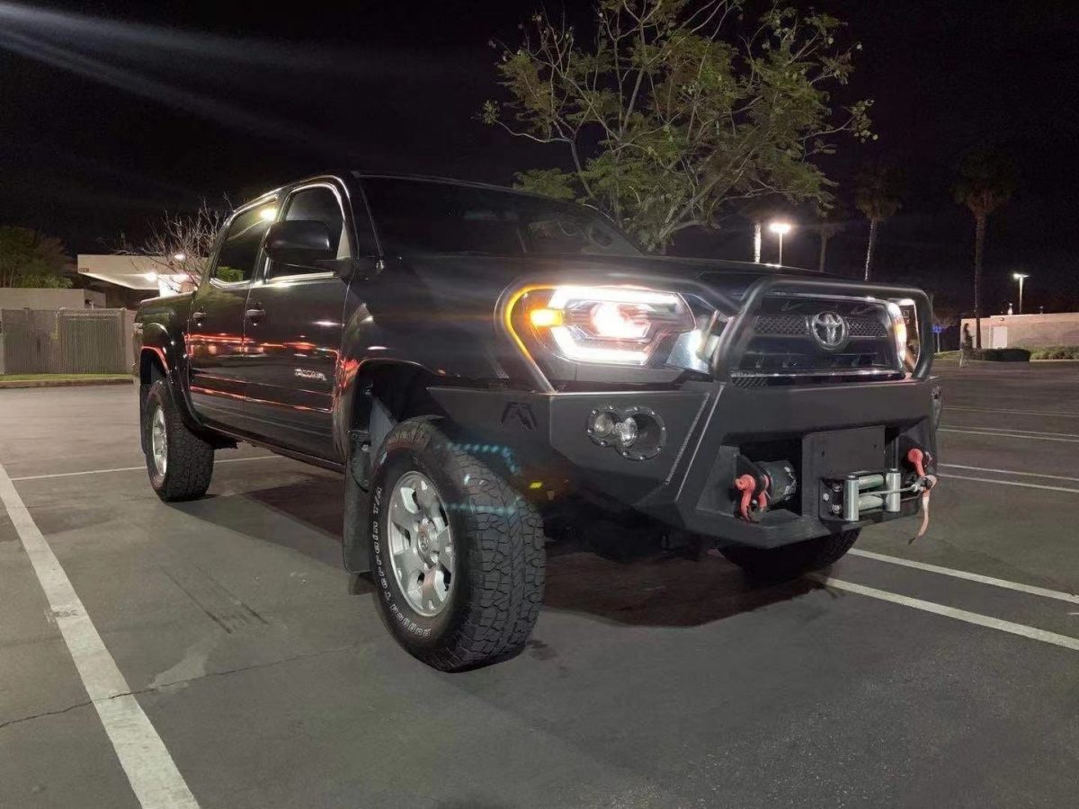 12-15 Toyota Tacoma PRO Series Halogen Projector Headlights Alpha Black - Upgrade Your Truck's Lighting for Night Driving & Off-Road Adventures