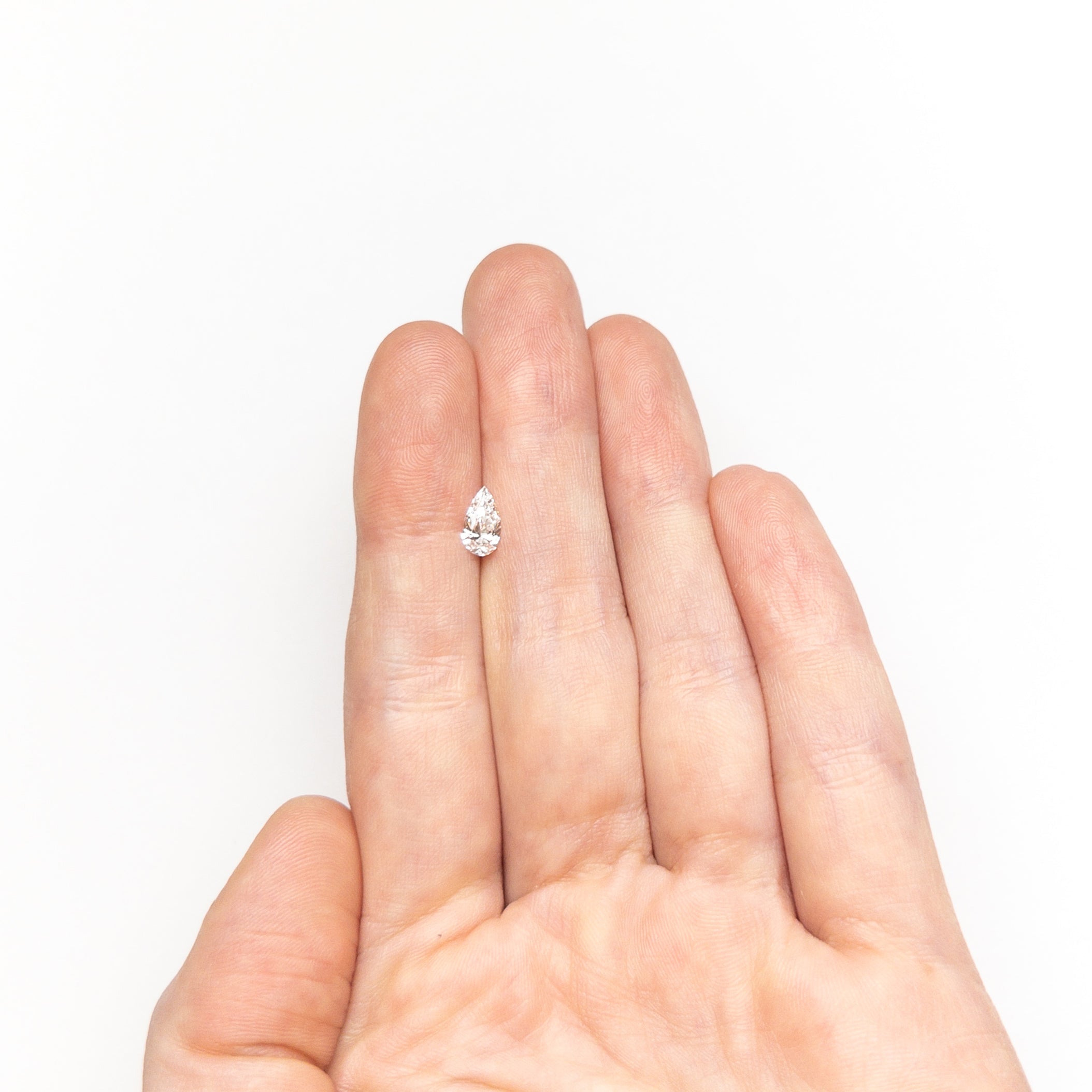 0.35ct Pear-Shaped Diamond (6.86x3.58x2.33mm) VS1 Clarity D Color Brilliant Cut - Perfect for Engagement Rings & Fine Jewelry