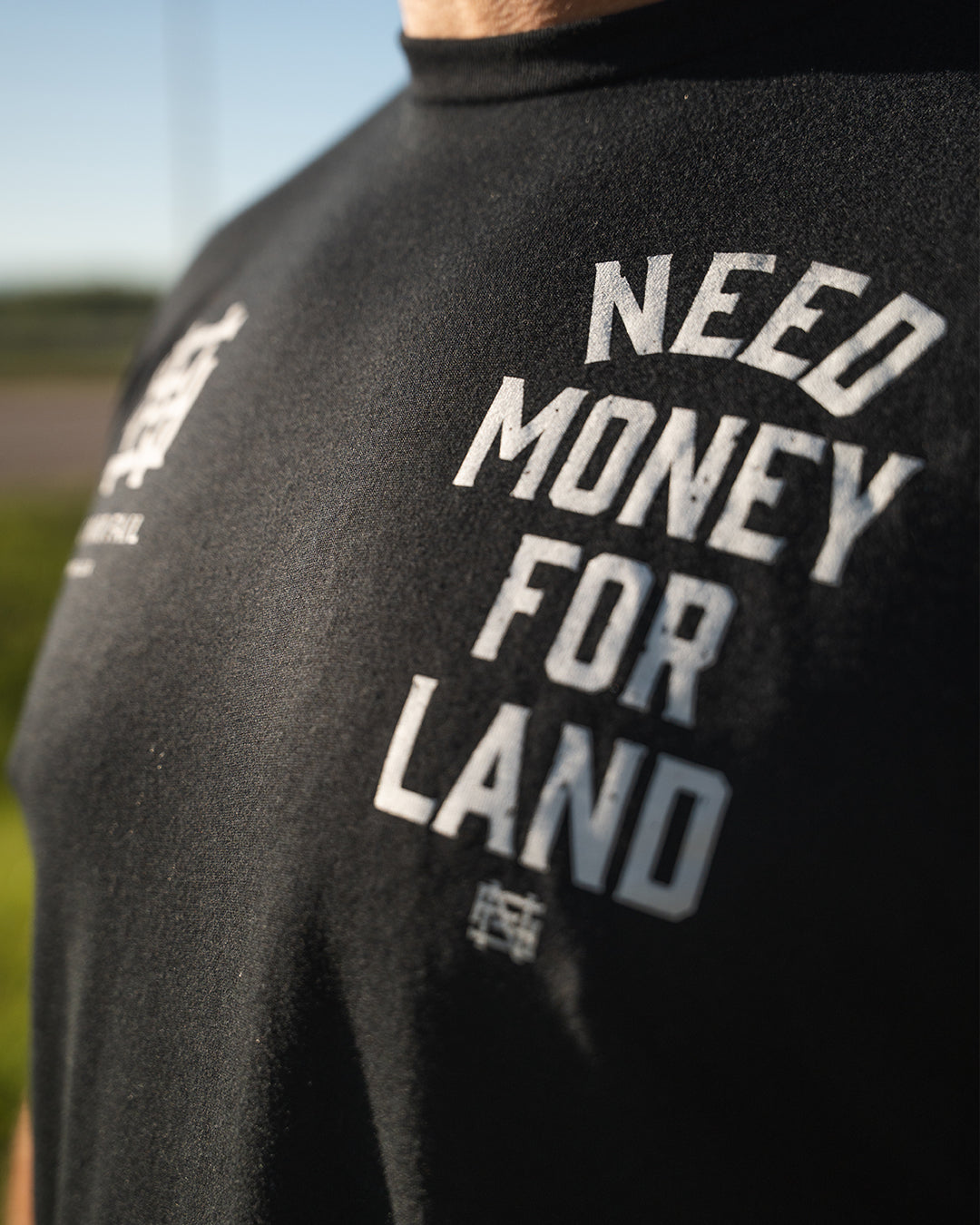 NEED MONEY FOR LAND T-Shirt - Premium Black Cotton Tee for Men & Women | Streetwear Fashion, Casual Wear, Urban Lifestyle