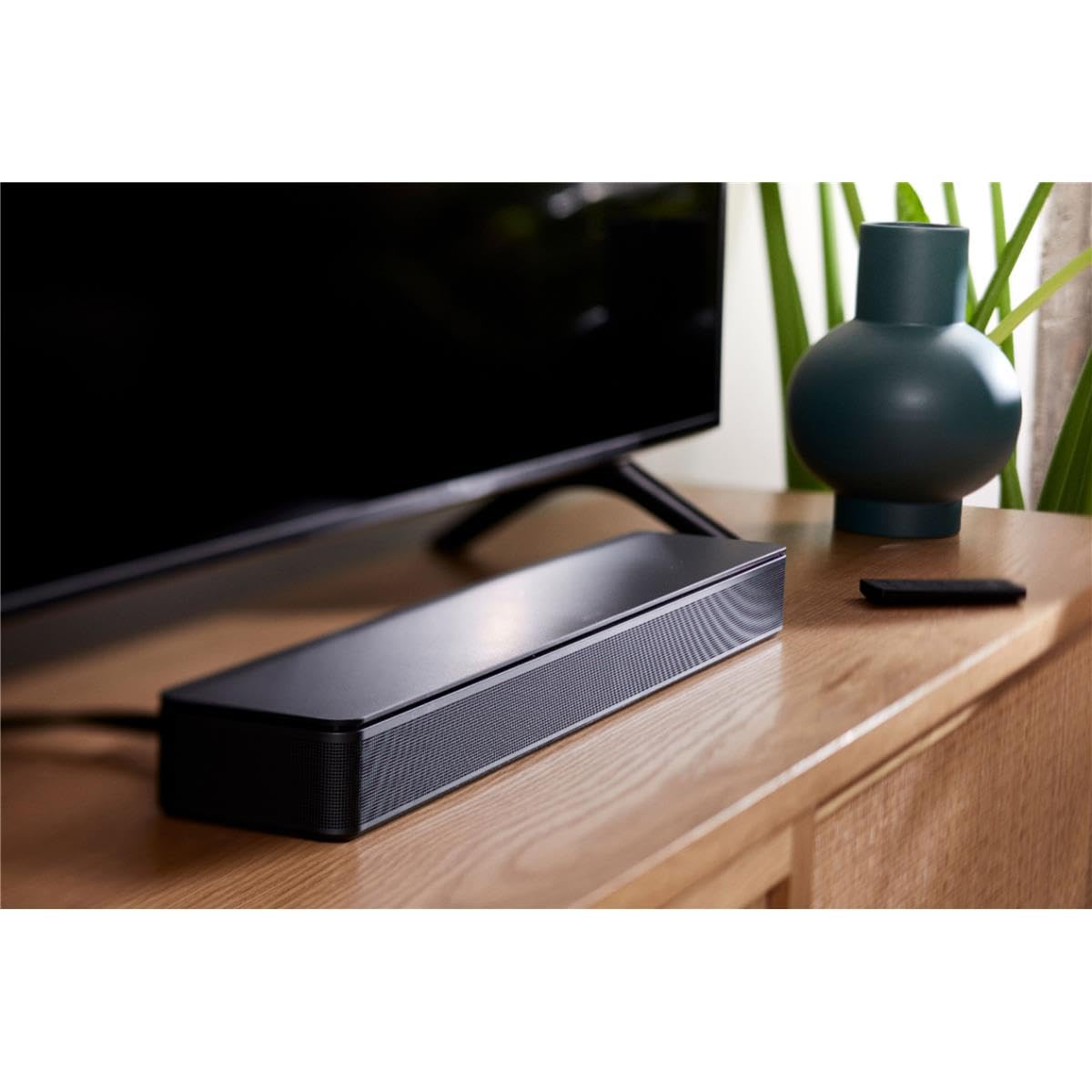 Bose TV Speaker - Premium Bluetooth Soundbar with HDMI-ARC for Crystal Clear Audio, Universal Remote Included - Perfect for Home Theater, Gaming & Movie Nights (Black)