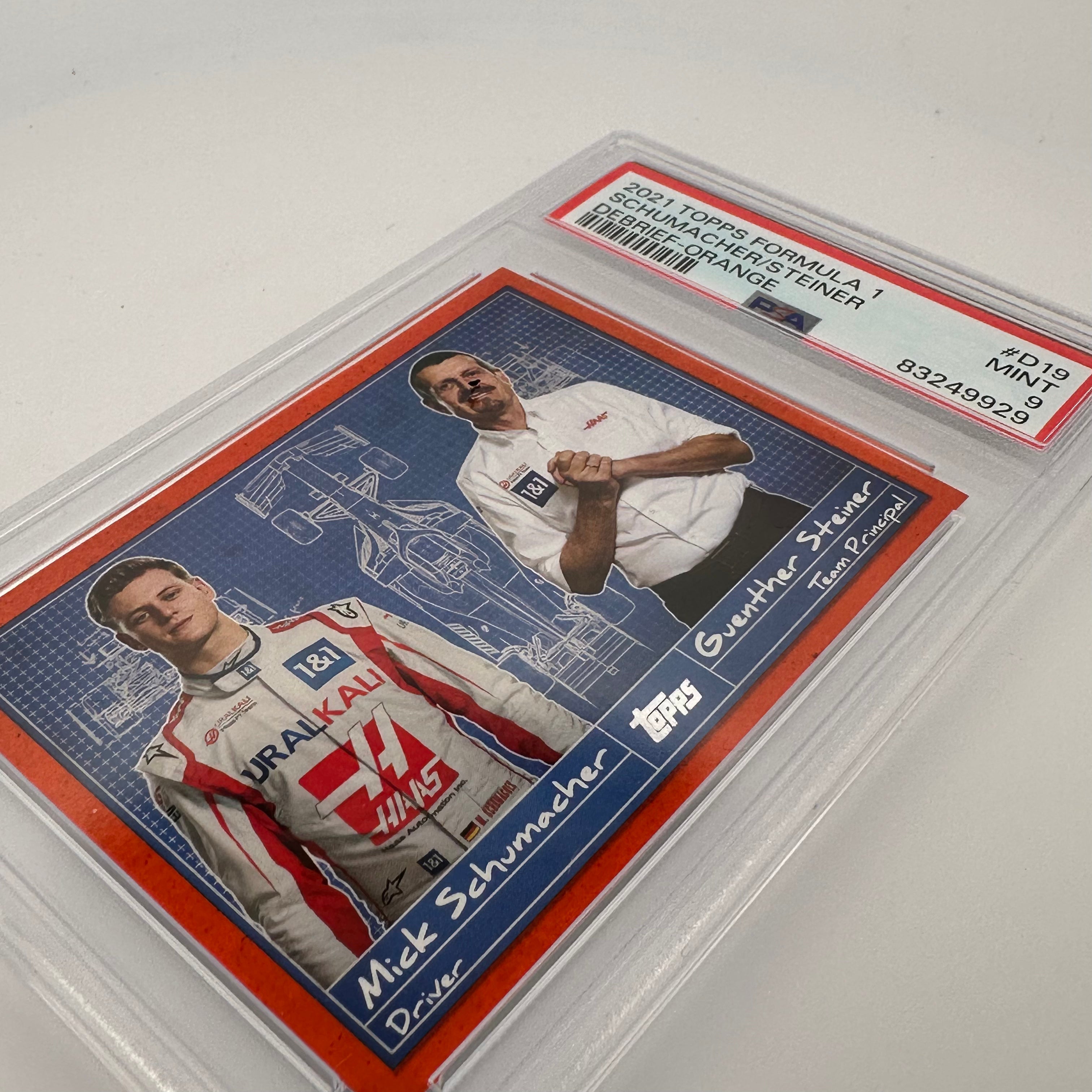 PSA 9 Graded 2/25 Mick Schumacher & Guenther Steiner F1 Debrief #D19 Orange - Perfect for F1 Collectors & Motorsport Fans Display