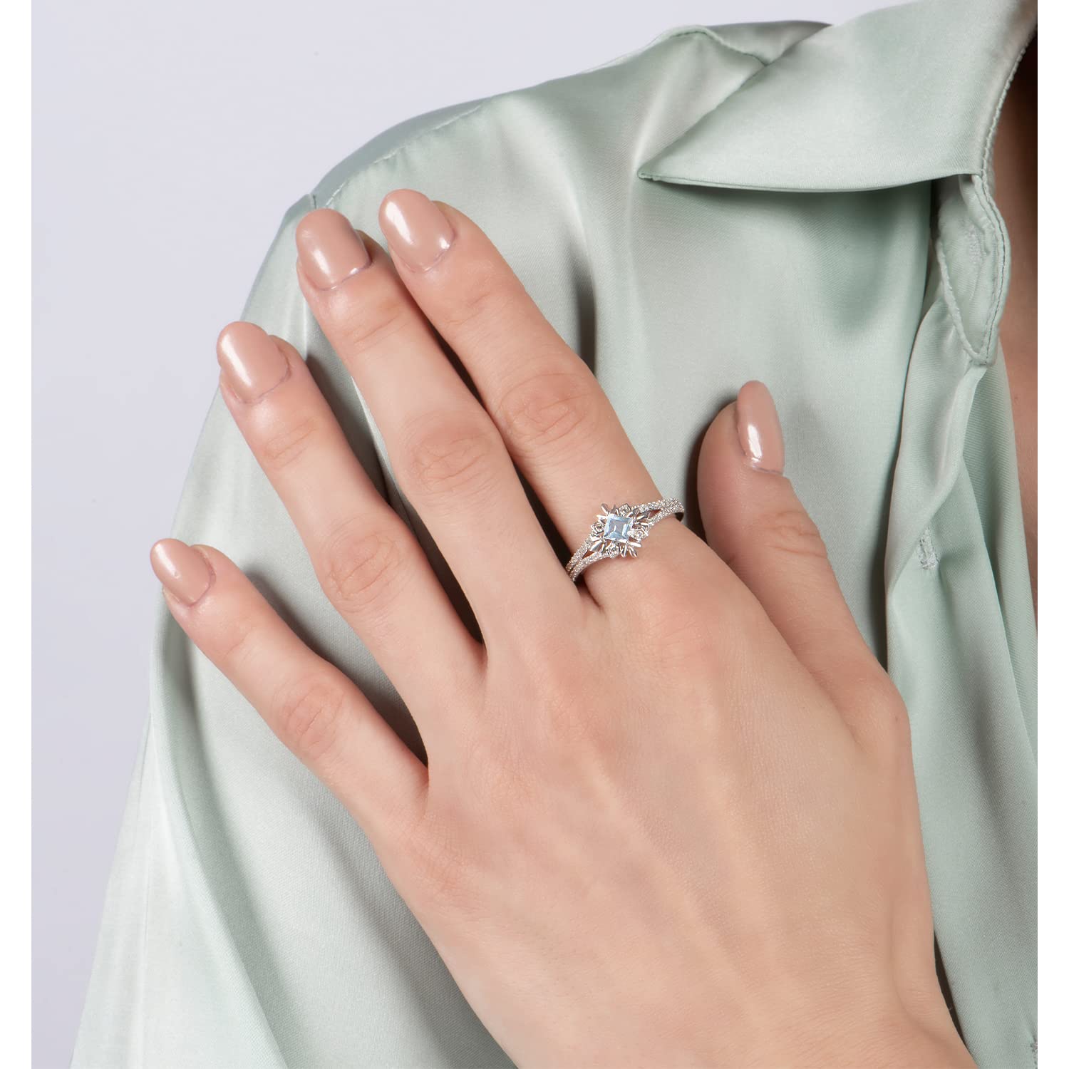 Jewelili Enchanted Disney Elsa Snowflake Ring - Sterling Silver with 1/5 Cttw Aquamarine & Diamond Center | Perfect for Disney Fans, Birthday Gifts & Special Occasions
