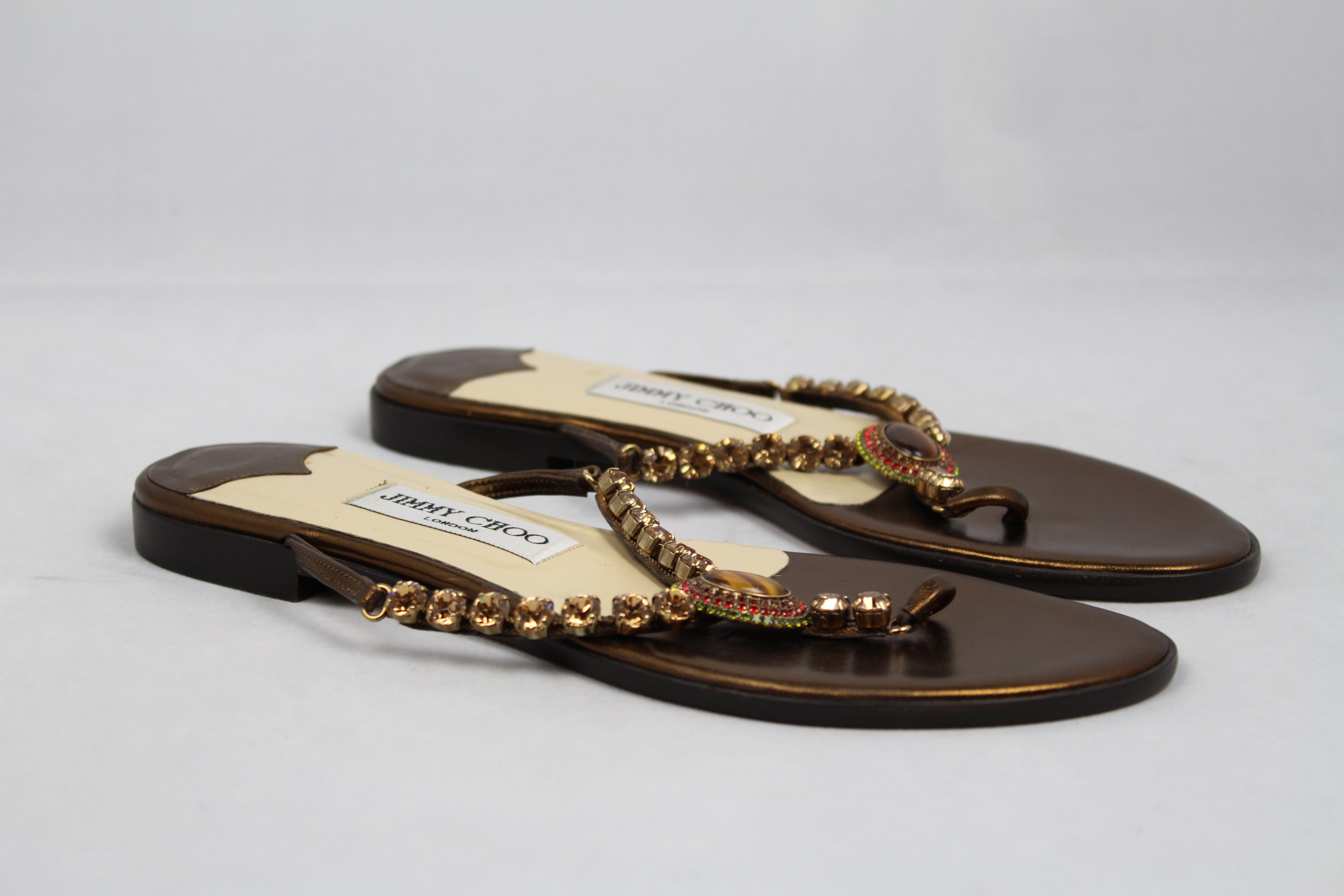 Jimmy Choo Bronze Flip Flops with Stones and Rhinestones - Size 37 | Elegant Summer Sandals for Beach, Pool, and Casual Outings