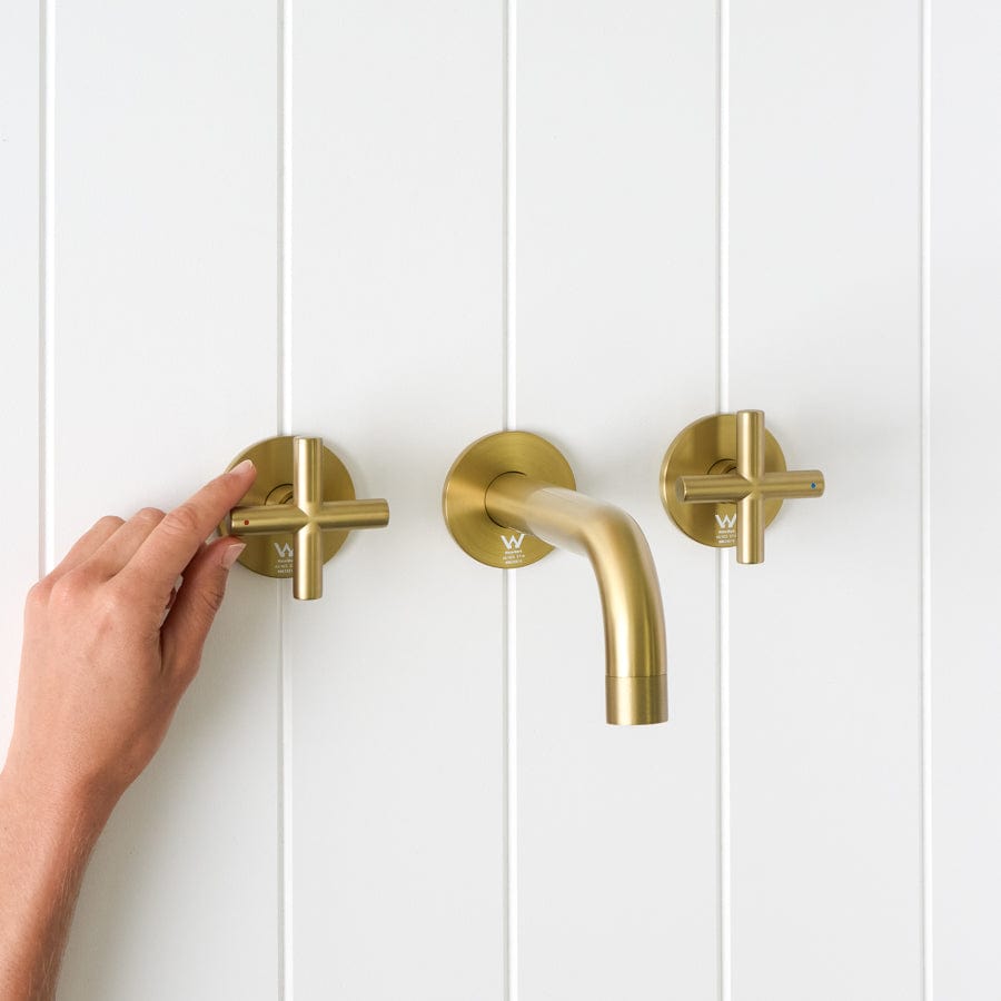Sydney Wall Spout with Cross Taps in Brushed Brass - Modern Bathroom Faucet for Sink and Vanity, Perfect for Home and Hotel Renovations