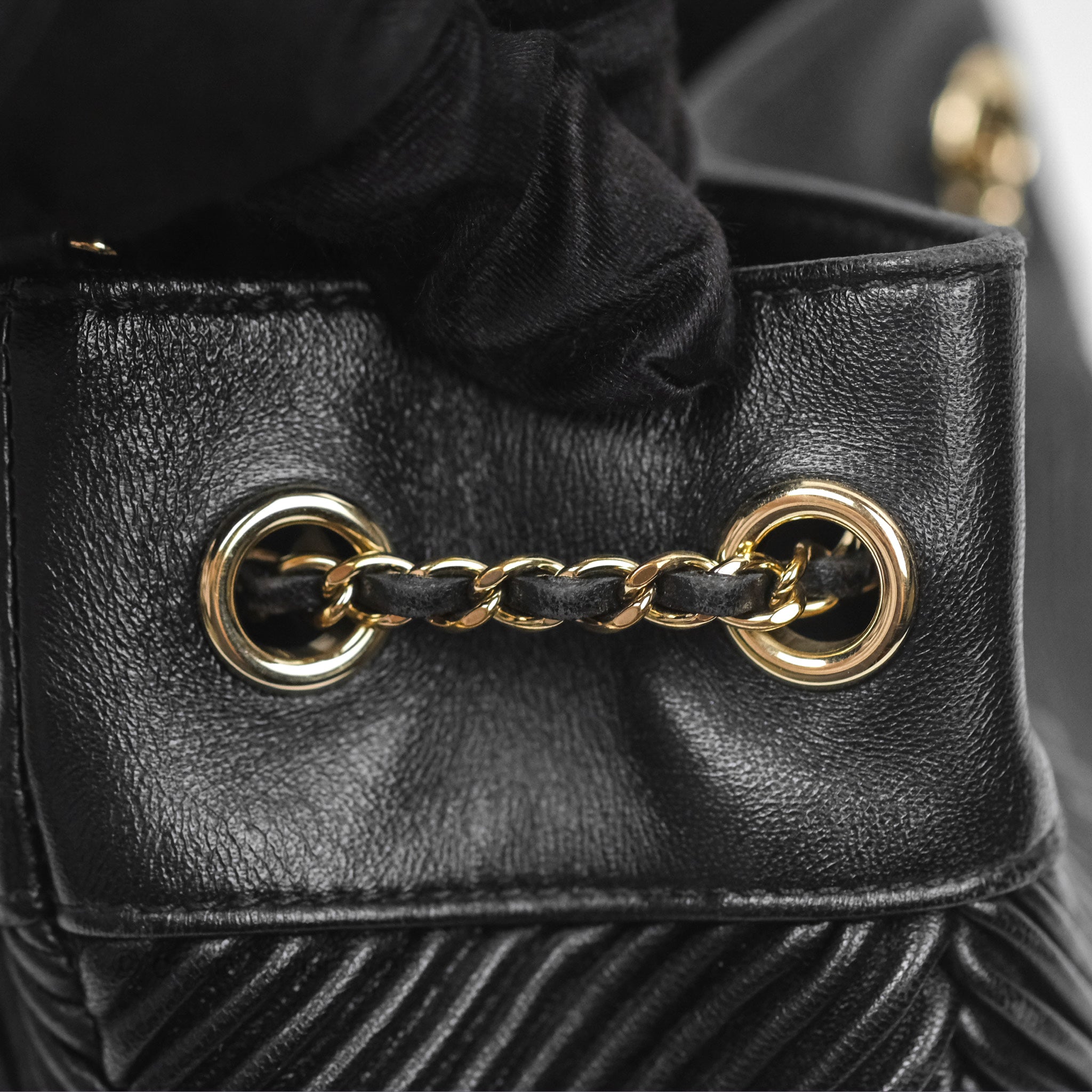 Chanel CC Chain Drawstring Bucket Bag Chevron Black Lambskin Gold Hardware - Luxury Crossbody Shoulder Bag for Women, Perfect for Parties, Date Nights & Special Occasions