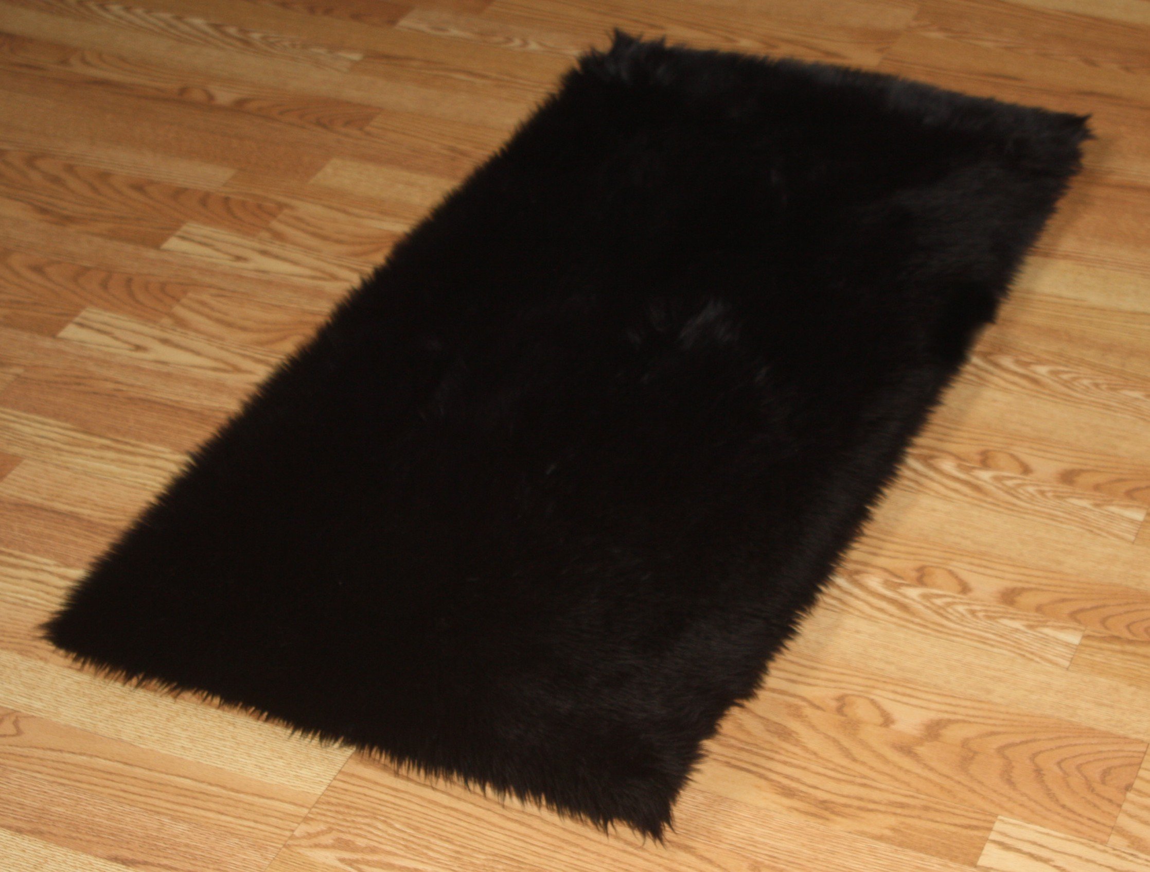 Flokati Faux Fur Area Rug 5x7 Feet - Soft Plush Shaggy Carpet for Living Room, Bedroom, Nursery - Luxurious Black Faux Fur Rug for Cozy Home Decor & Warm Winter Style