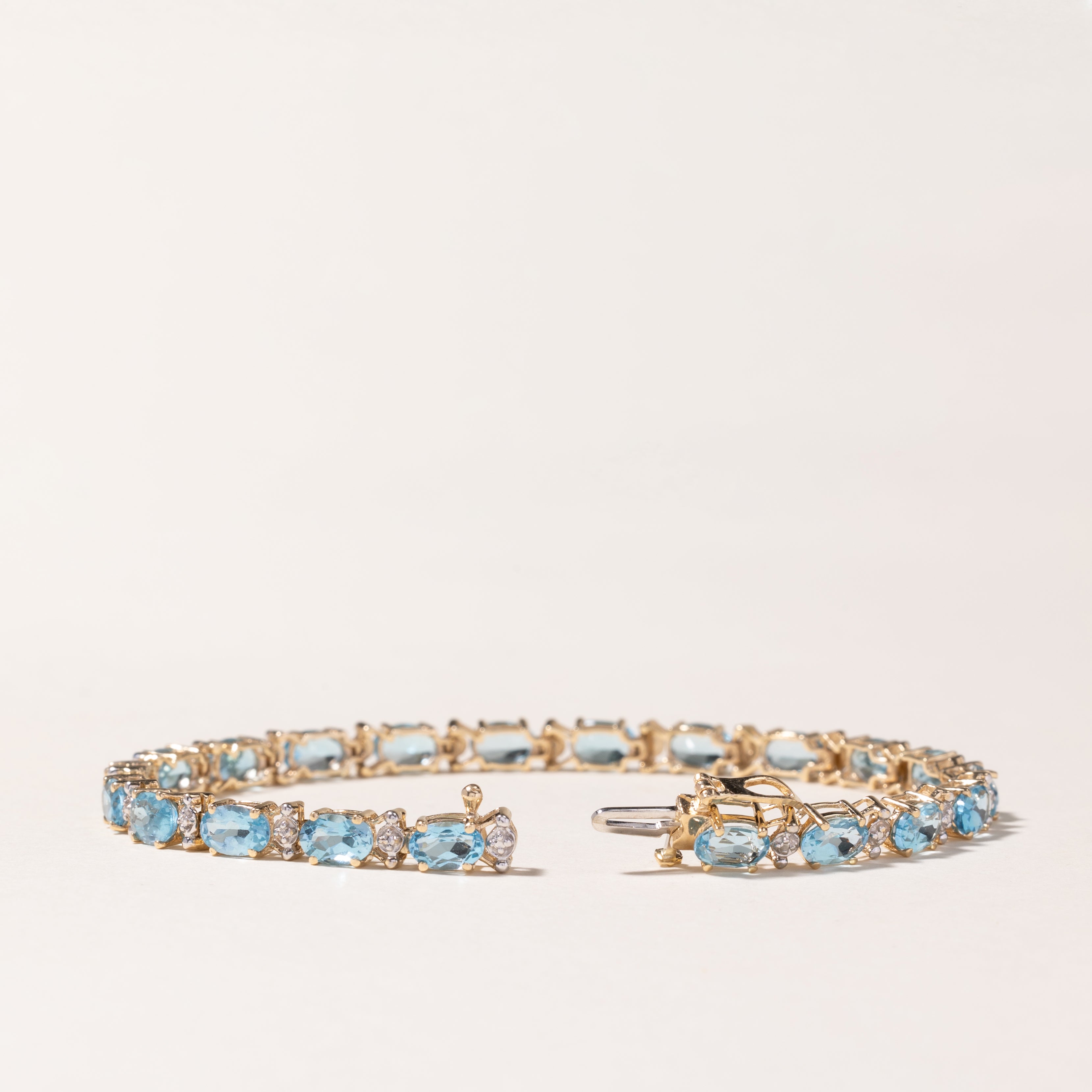 10K Yellow Gold Blue Topaz Tennis Bracelet | 7.25 Inch | 10.29ctw Natural Topaz & 0.01ctw Diamond Accents | Elegant Jewelry Gift for Women | Perfect for Weddings, Anniversaries & Special Occasions