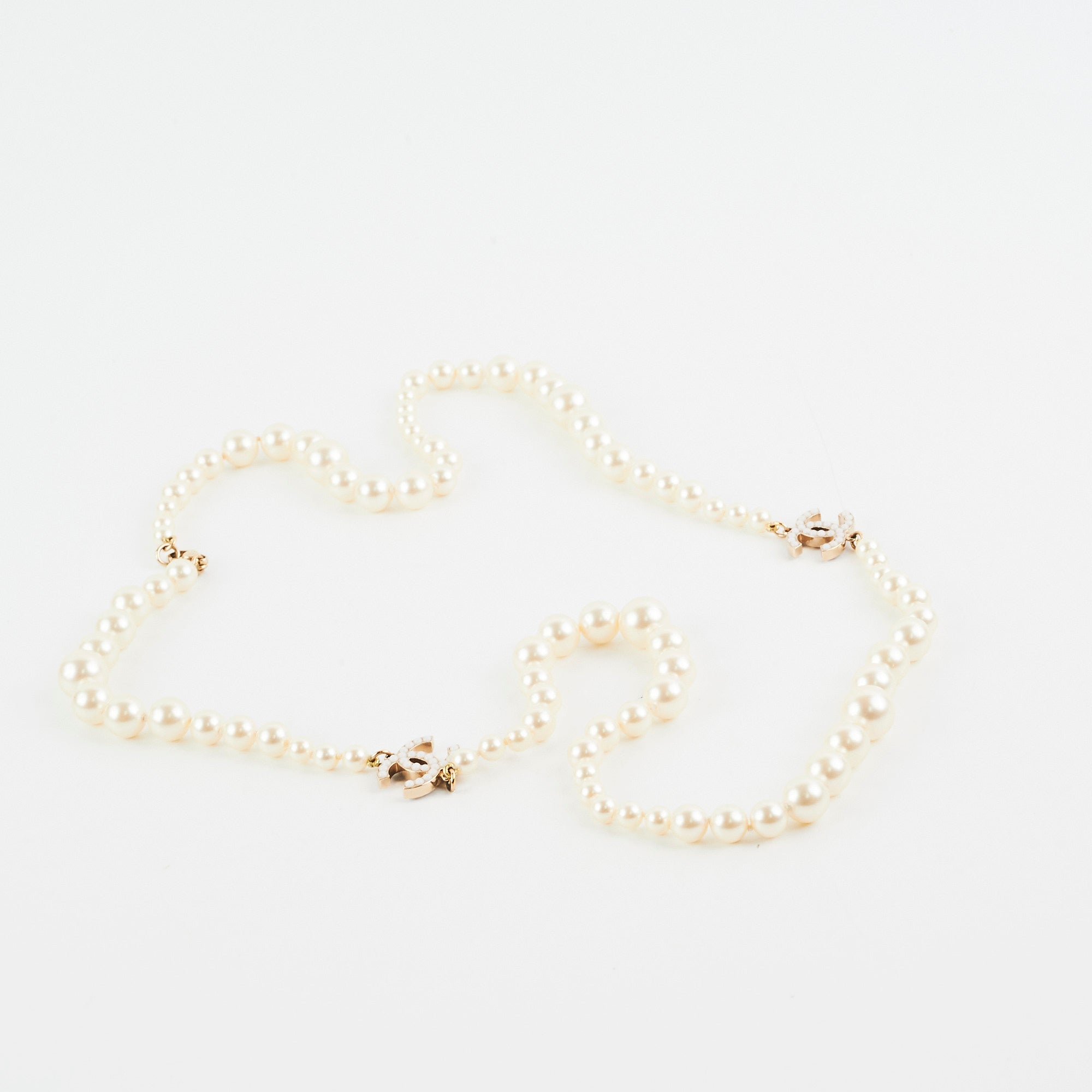 Chanel Long Pearl CC Logo Necklace - Elegant Costume Jewelry for Women | Perfect for Parties, Weddings & Special Occasions