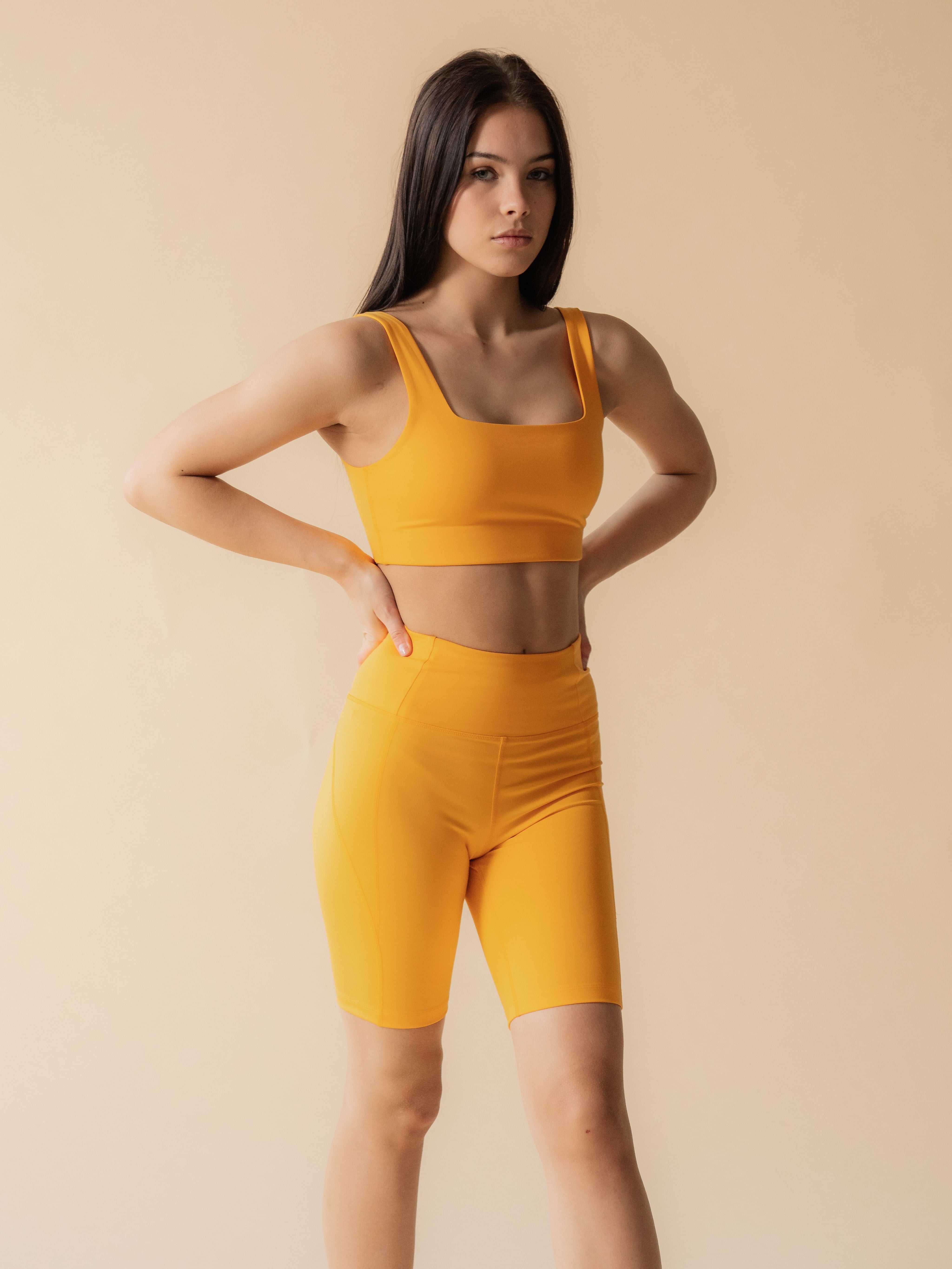 Girlfriend Collective High Waist Compressive Bike Shorts for Women - Golden Glow | Workout, Running, Yoga & Cycling | Moisture Wicking & Breathable Activewear