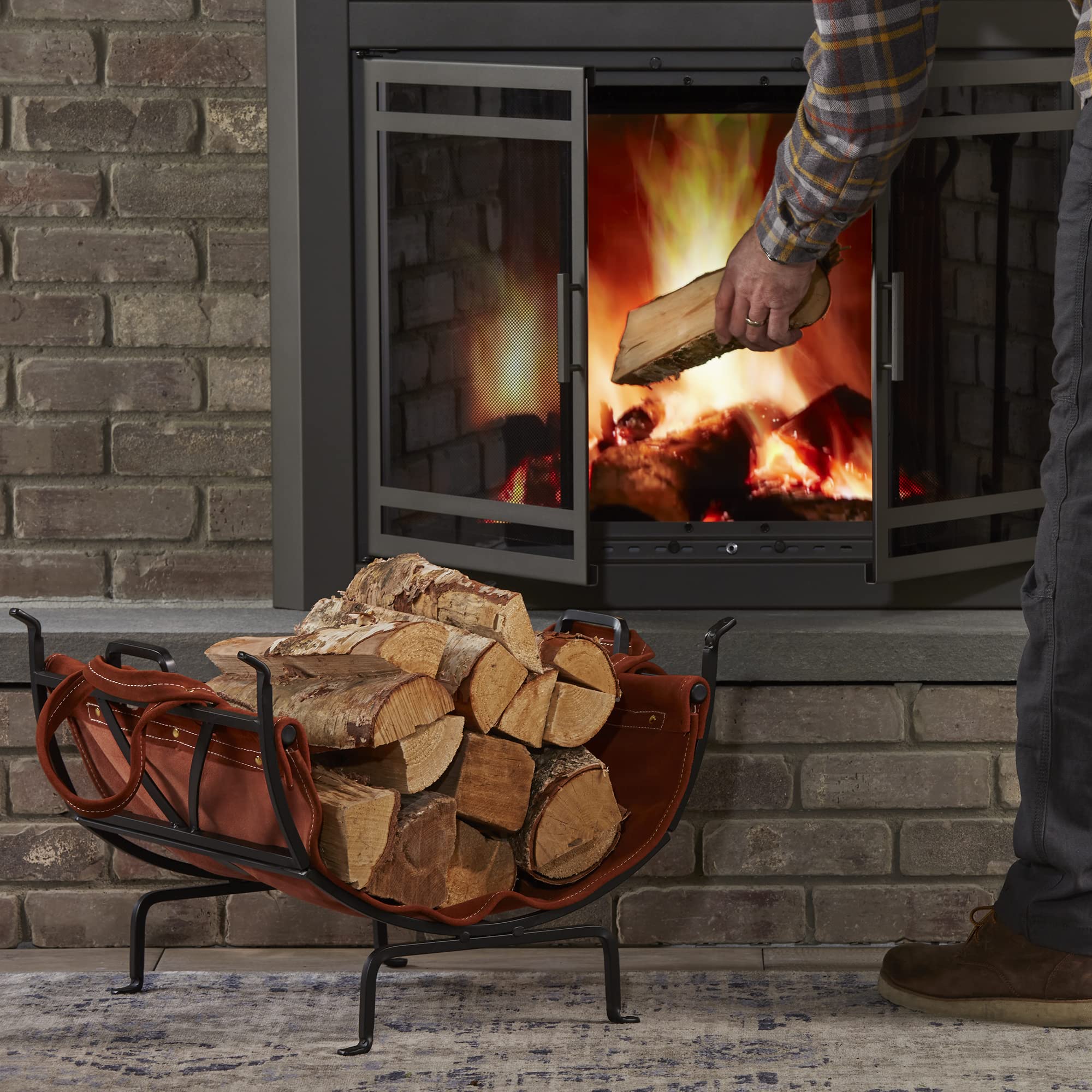 UniFlame Black Wrought Iron Firewood Log Holder with Leather Carrier - Outdoor Firewood Storage for Fireplace, Camping, and Patio Use