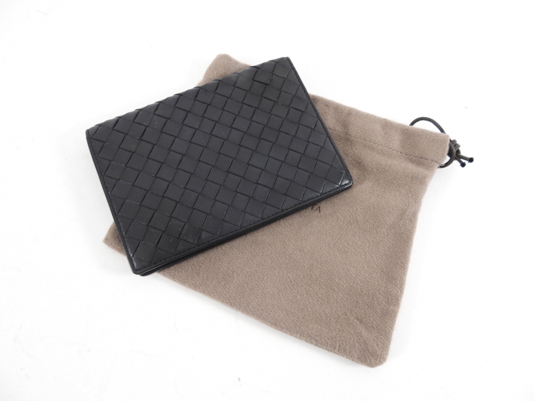 Bottega Veneta Black Intrecciato Leather Passport Wallet - Luxury Travel Accessory for Men & Women, Perfect for Airports and International Trips