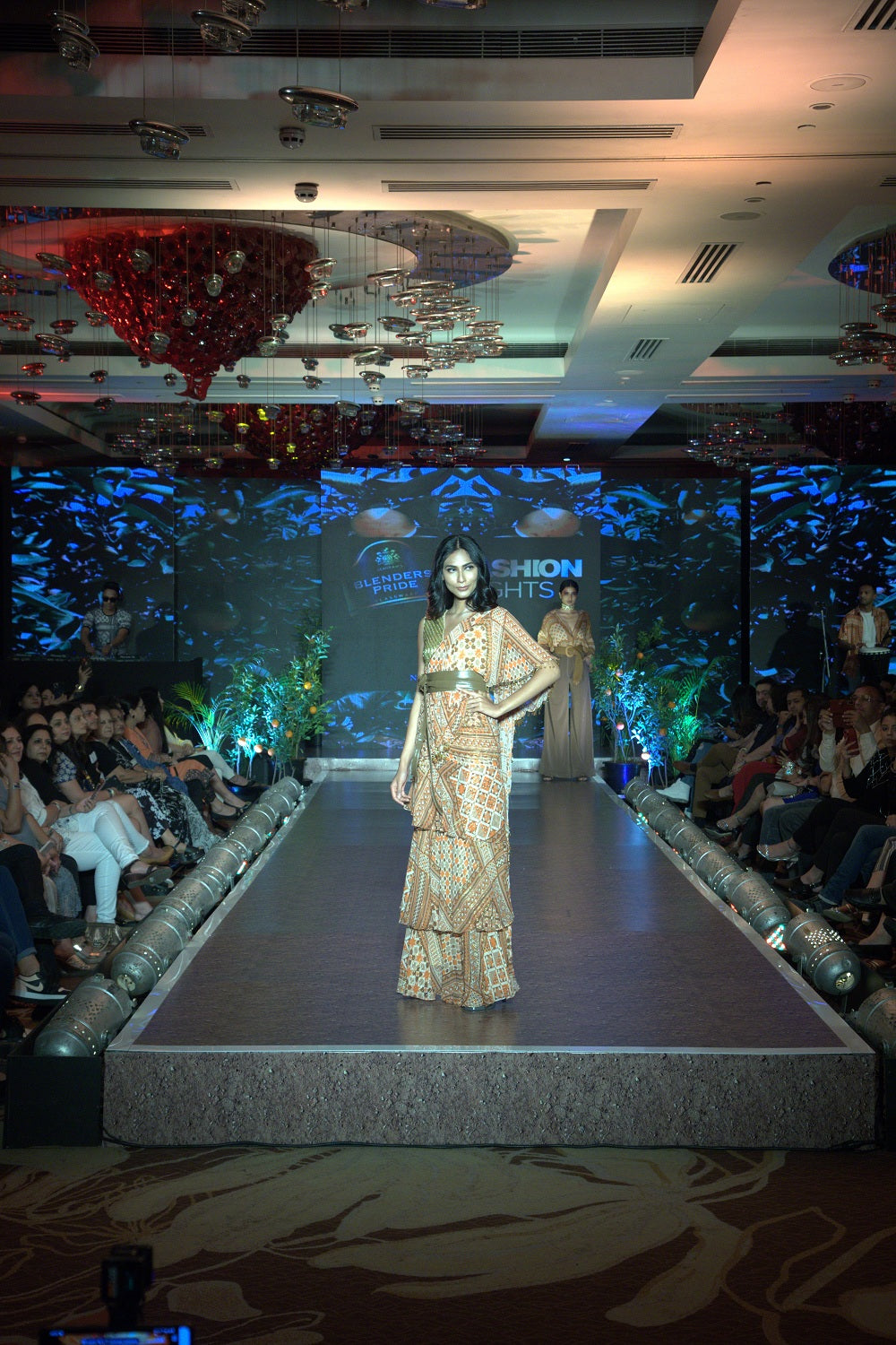 Stylish Tangerine Tribal Print Lurex Ruffle Saree with Matching Blouse - Perfect for Diwali, Weddings & Special Occasions